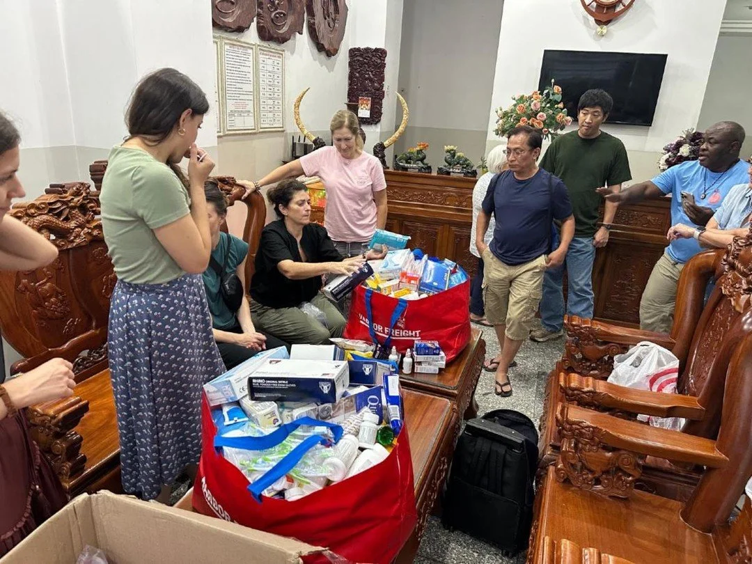 Missionaries sorted donations of medicine, supplies and treats for the communities they will be serving.