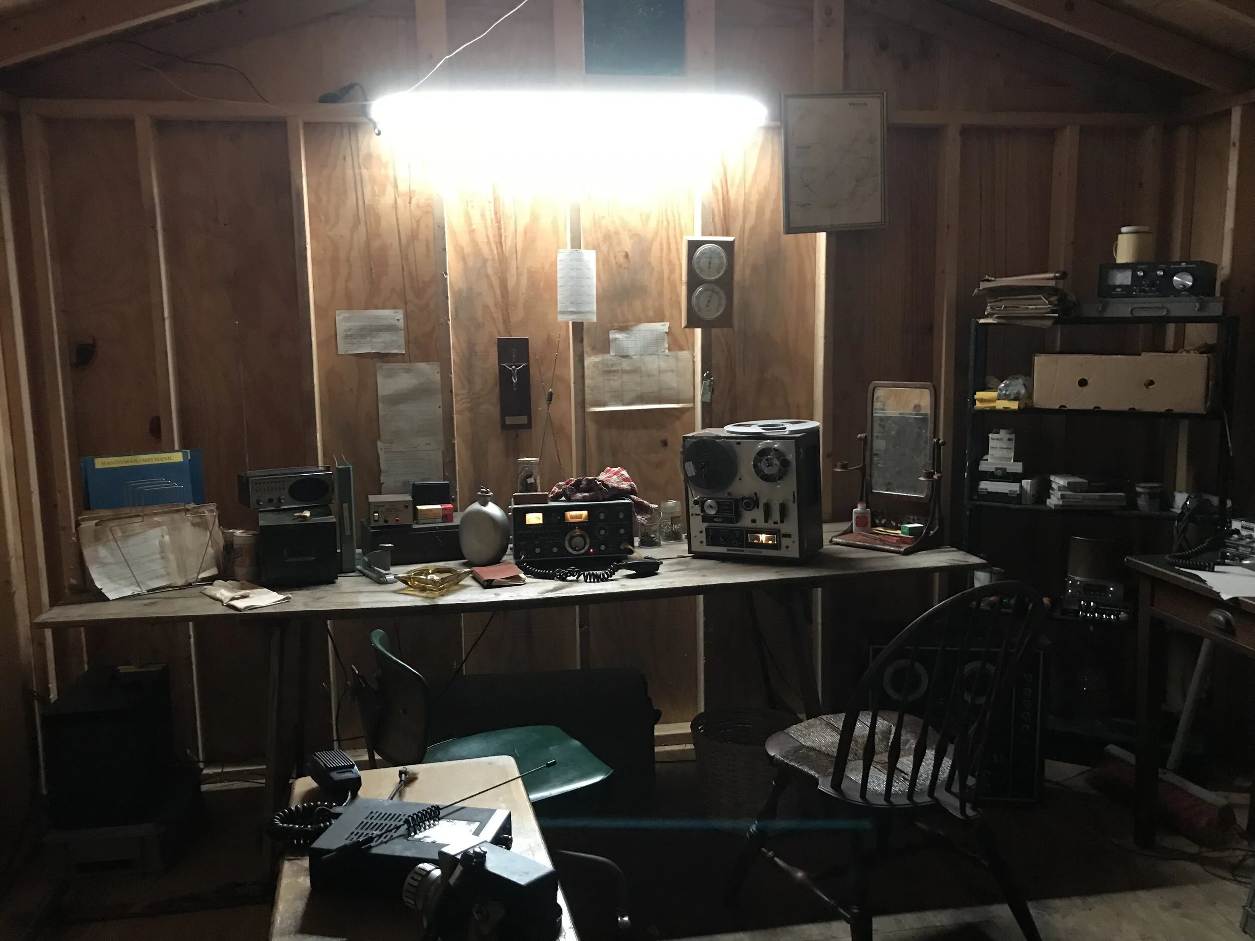 Jonestown INT. Jim Jones Radio Room 