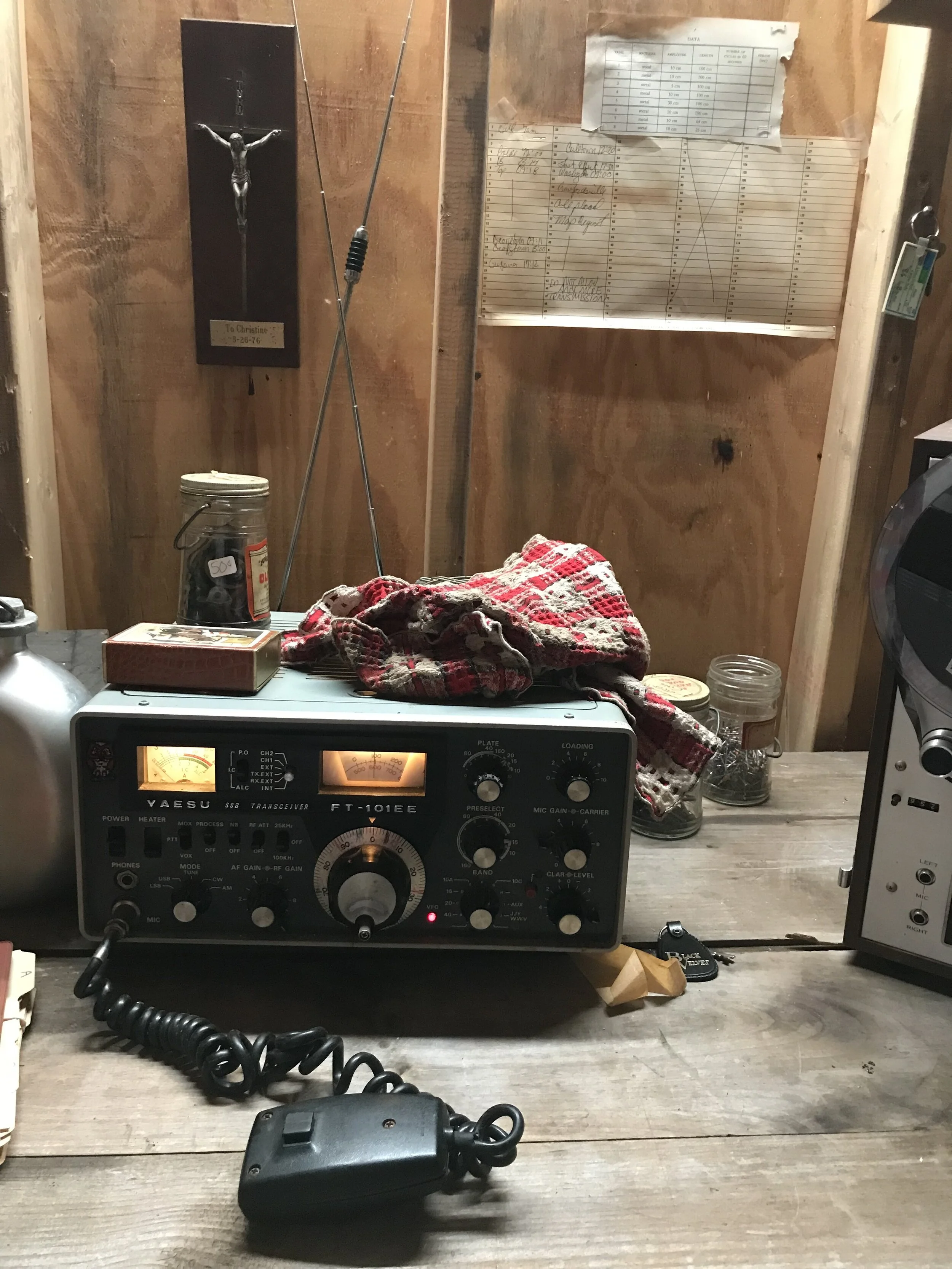 Jonestown INT. Jim Jones Radio Room 