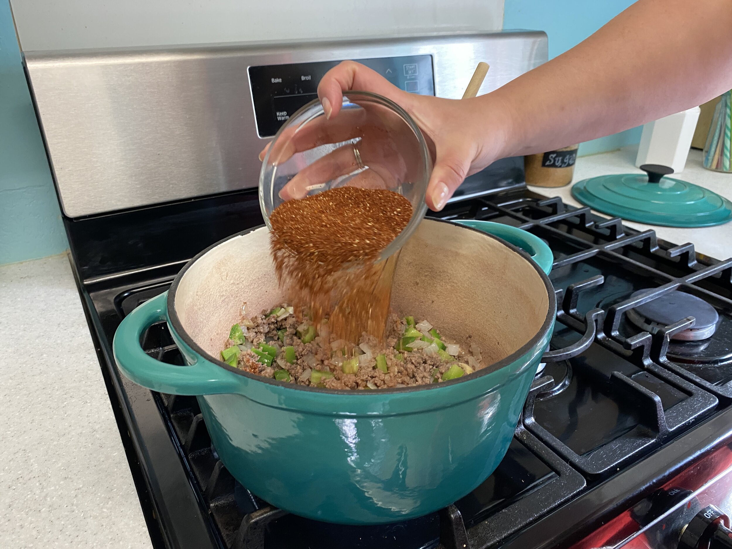 It’s really easy to burn spices when you add them before you add the majority of liquid. Feel free to turn down the heat a bit before you add it.