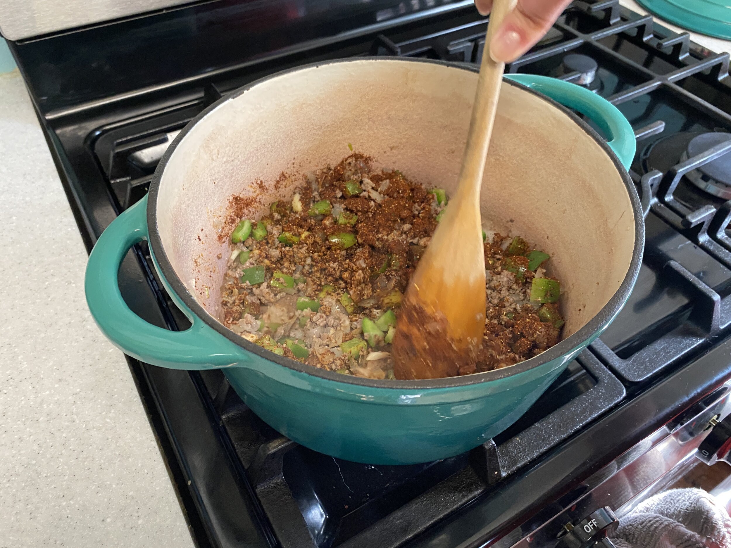 Keep the mixture in the pot moving so nothing sticks. The idea is to get everything coated with the spice mixture. After a minute or so you should be able to smell the spices frying a bit.