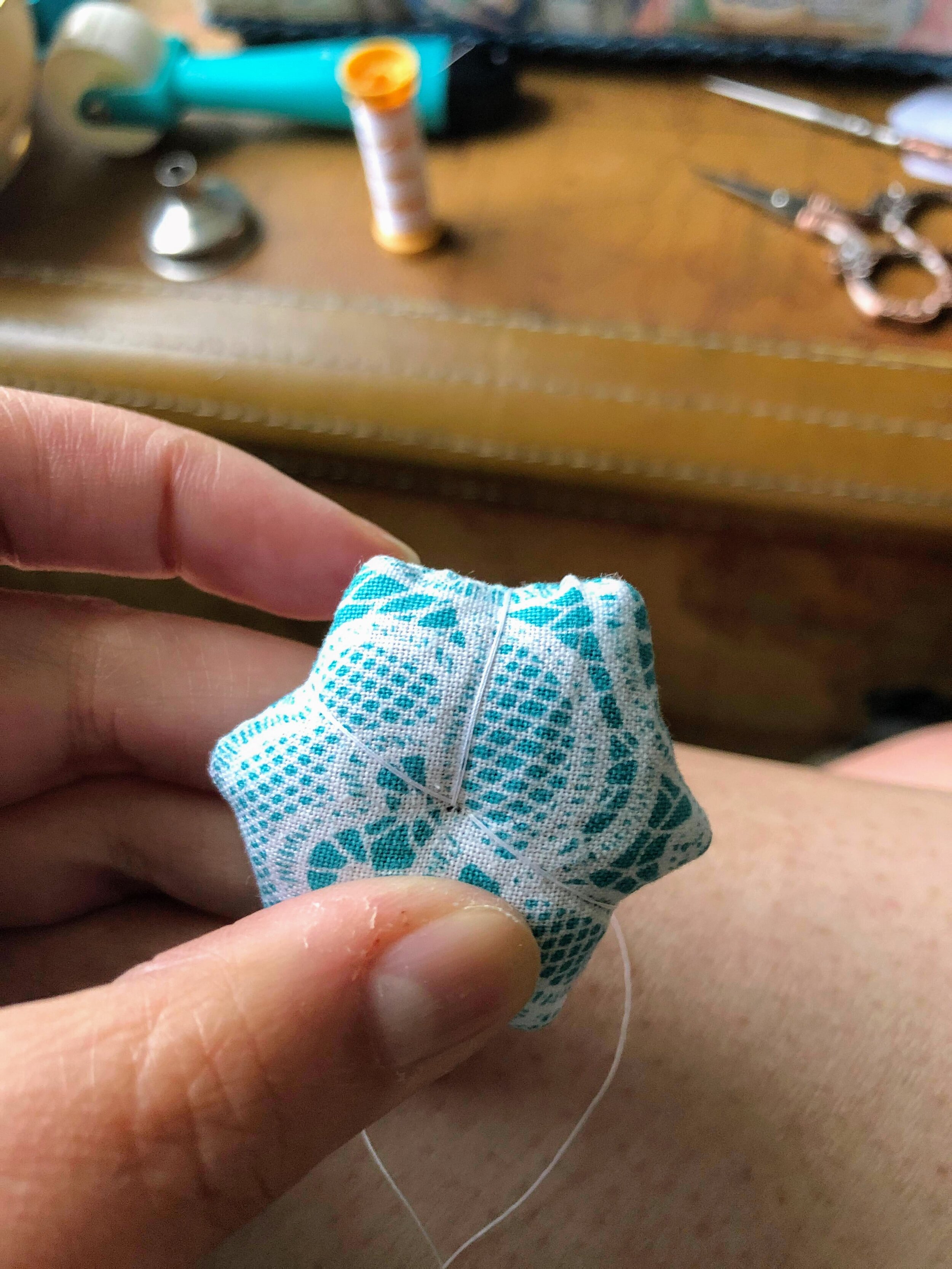 Pull the thread firmly