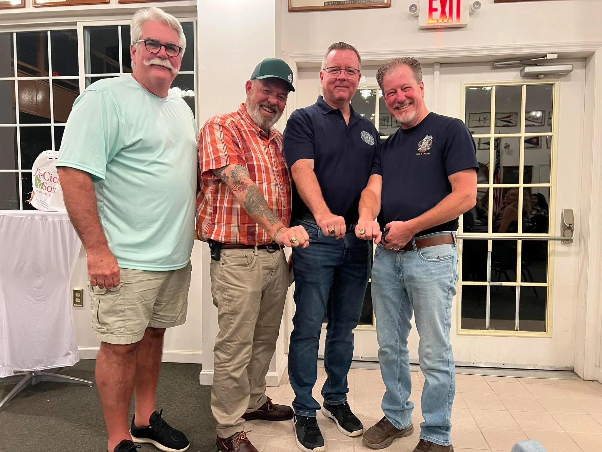 2025 20 year rings presented to Pipers Sean Horsefield, Ed Devlin, and Pete Kalmes Sr.