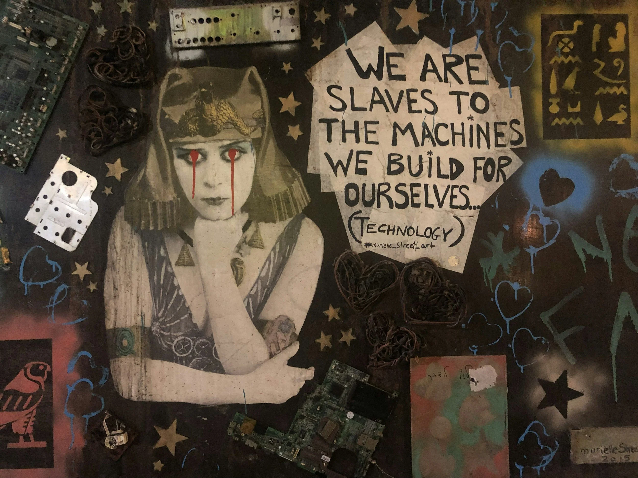 Collage that reads "we are slaves to the machines we build ourselves.