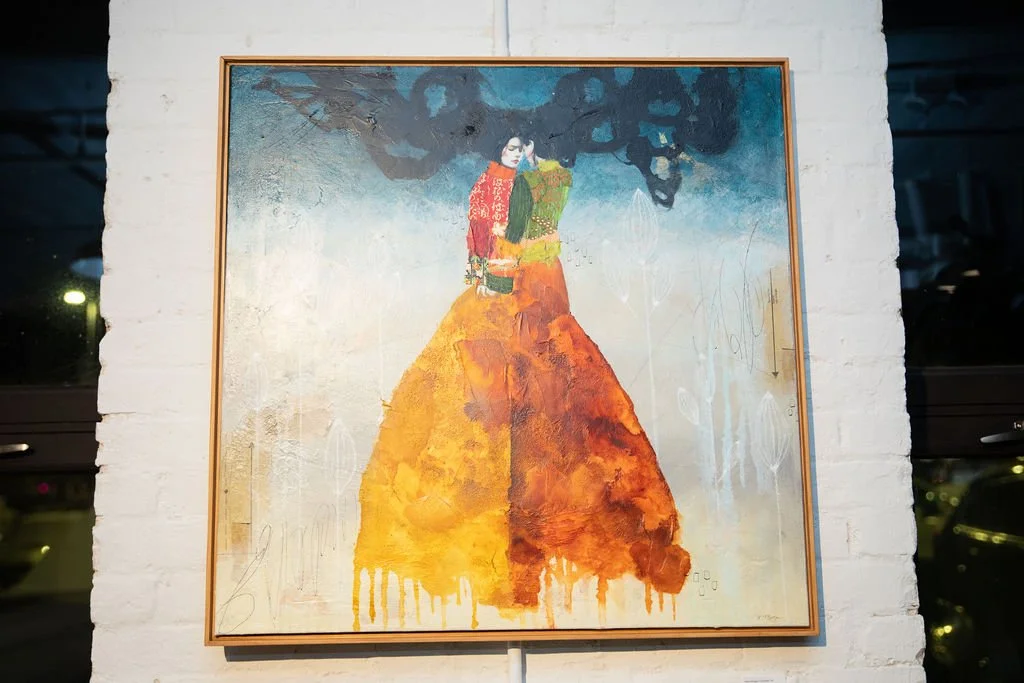 Abstract painting of a woman in a colorful dress