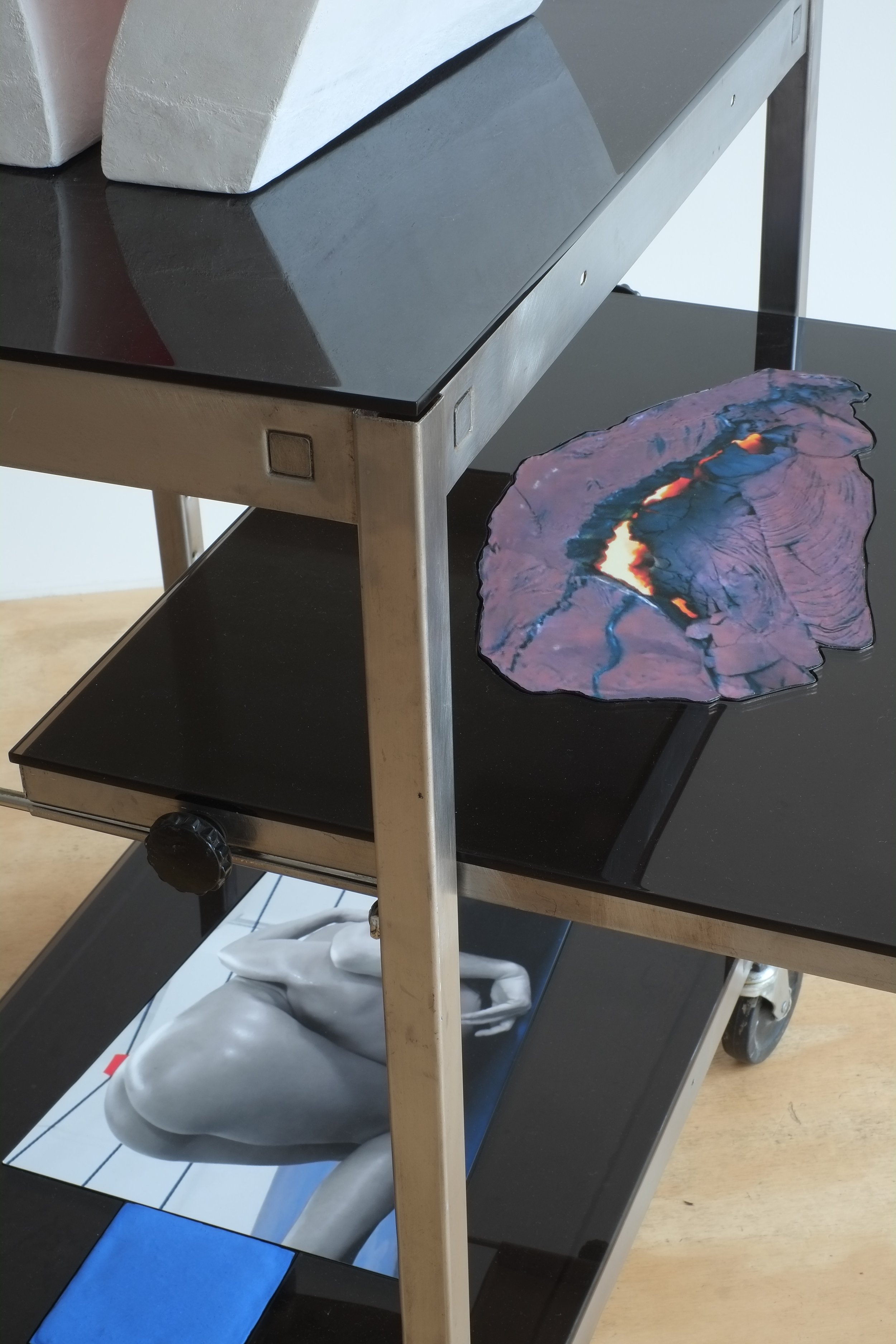 Detail. Sarah Anderson. Nude #5, 2022. Fresco object, steel cart, plexiglass, inkjet print, aqua resin. 27 x 25 x 45 inches.