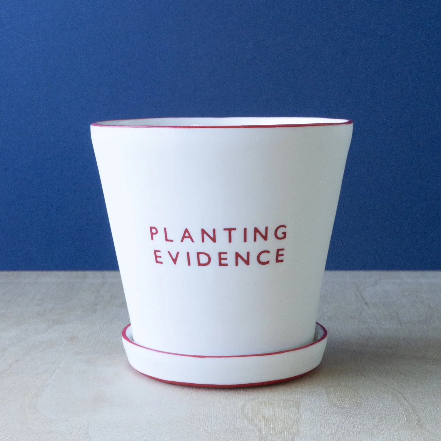 Wordplay Clay - Planting Evidence Red (1).jpg