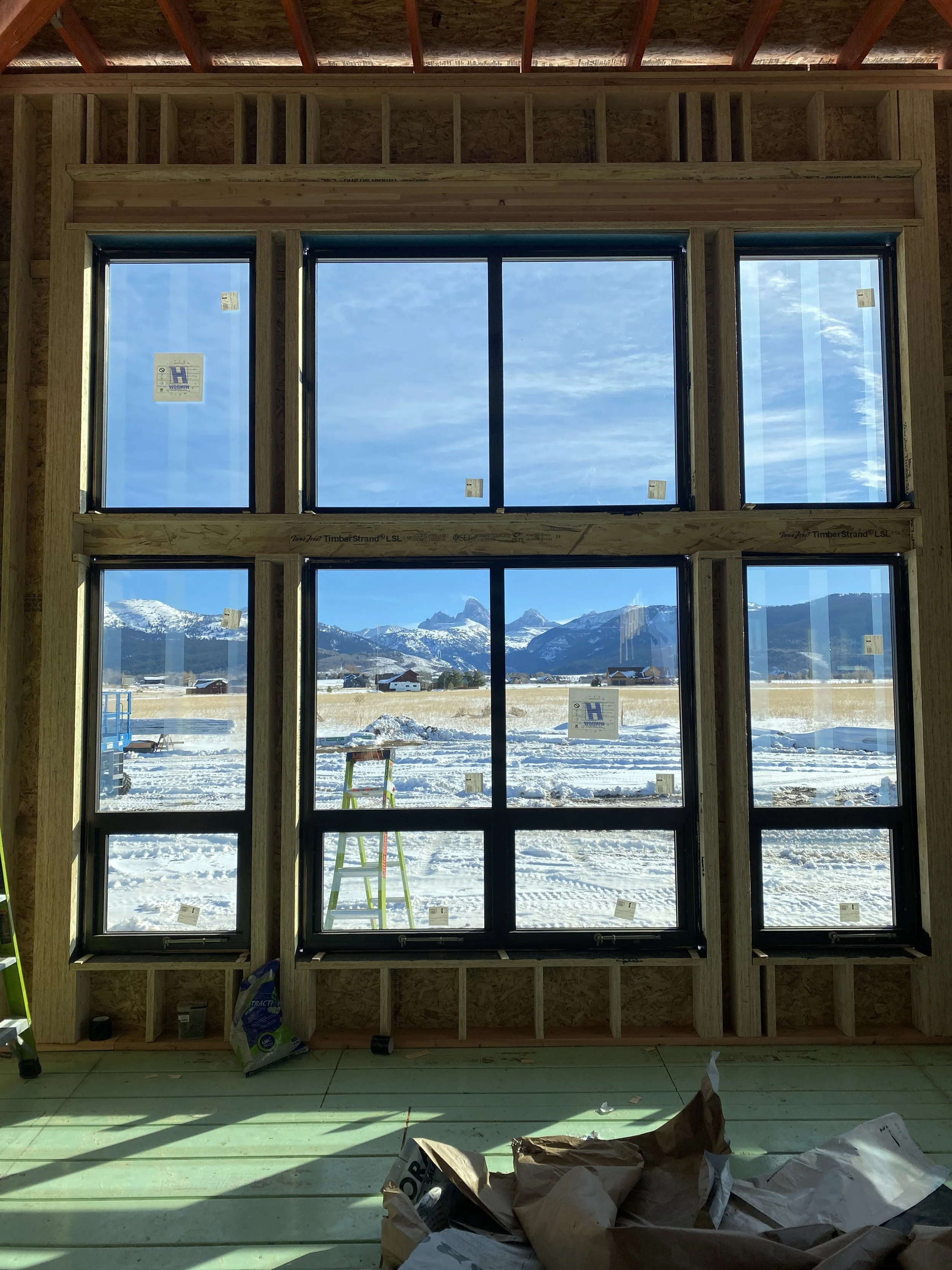 A million dollar view. The Grand Tetons in the foreground of every sunrise. This Luxury custom home features radiant heat, staggered stud walls to prevent thermal bridging, and a hepa quality air filtration system 