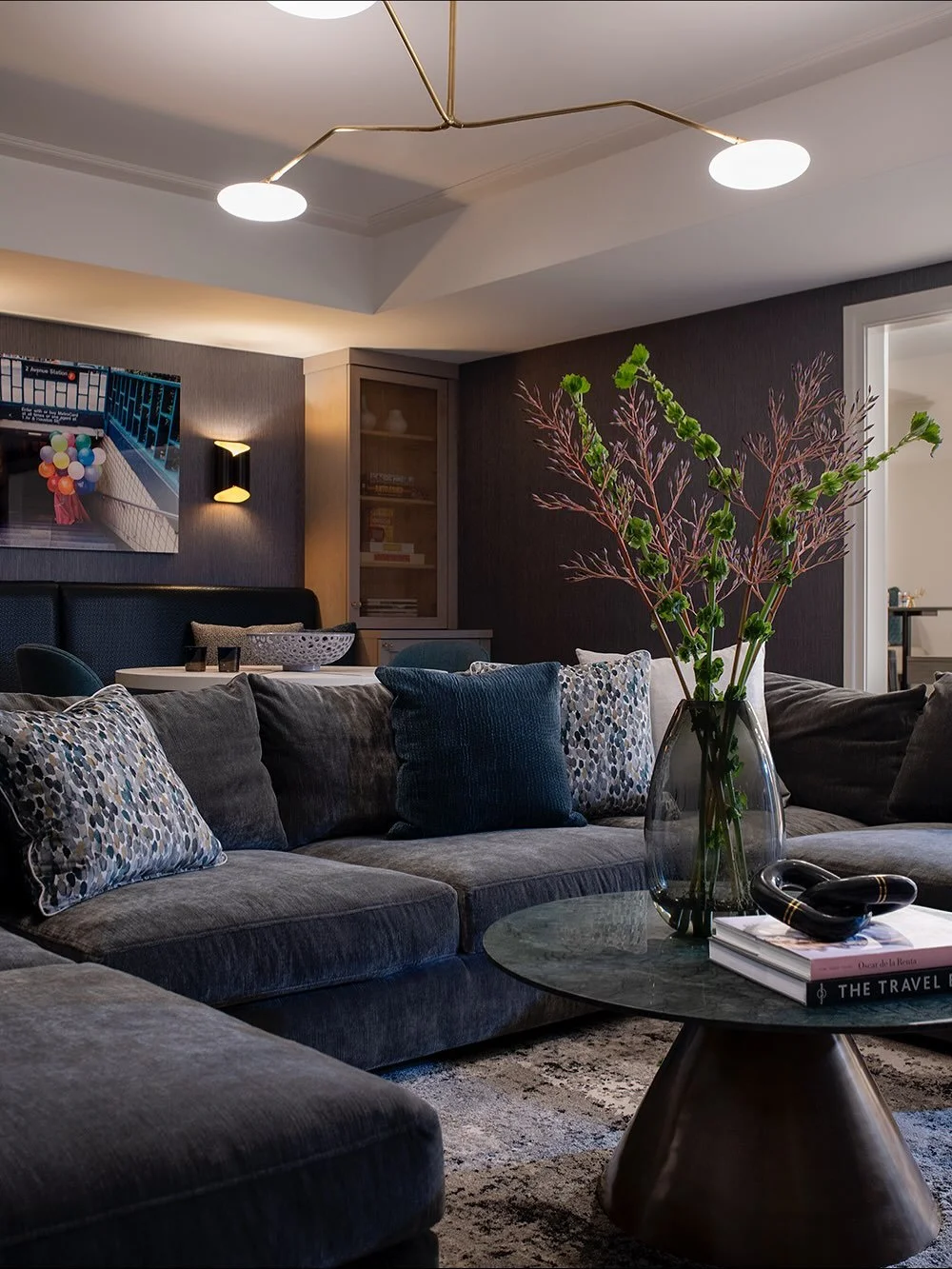 This Wellesley game room had good bones but the layout wasn&rsquo;t working. Our solution: a custom built-in banquette and repositioned game table that transformed how this family uses the space.

Before: Furniture placement that felt disconnected

A