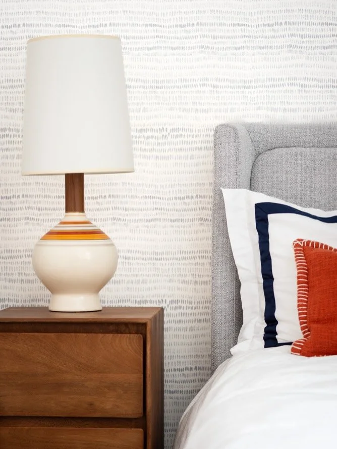 I think about walls differently in bedrooms. They should feel like a soft landing, present but not loud, grounding but not heavy. Rebecca Atwood&rsquo;s Dashes does this beautifully. The hand painted brushstrokes add just enough movement to keep the 