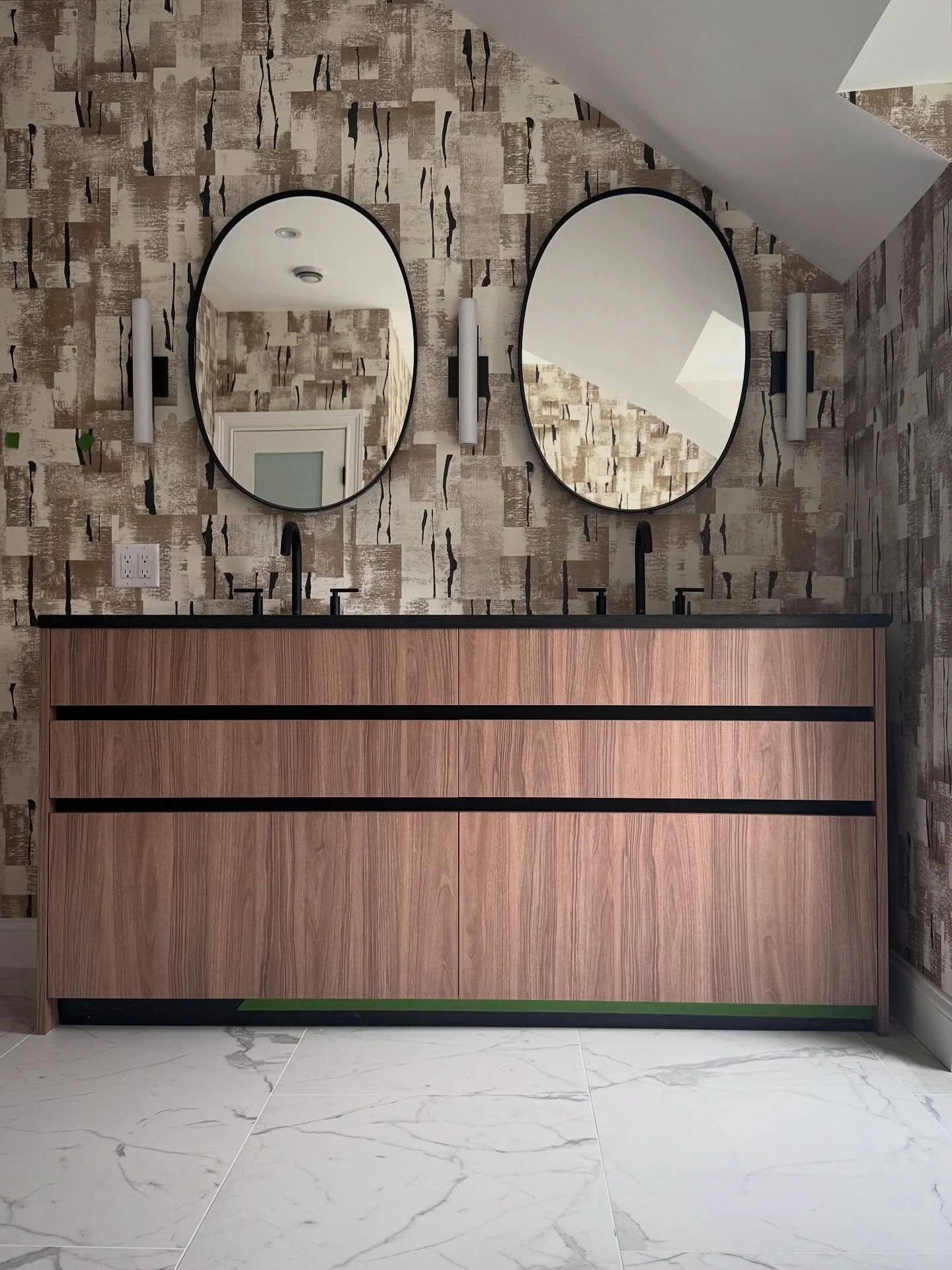 Sat on the floor yesterday just taking it all in. This project is almost done and moments like this remind me why I do this work. The wallpaper, the walnut, the marble underfoot. Everything landed exactly where it was supposed to (except for that gre