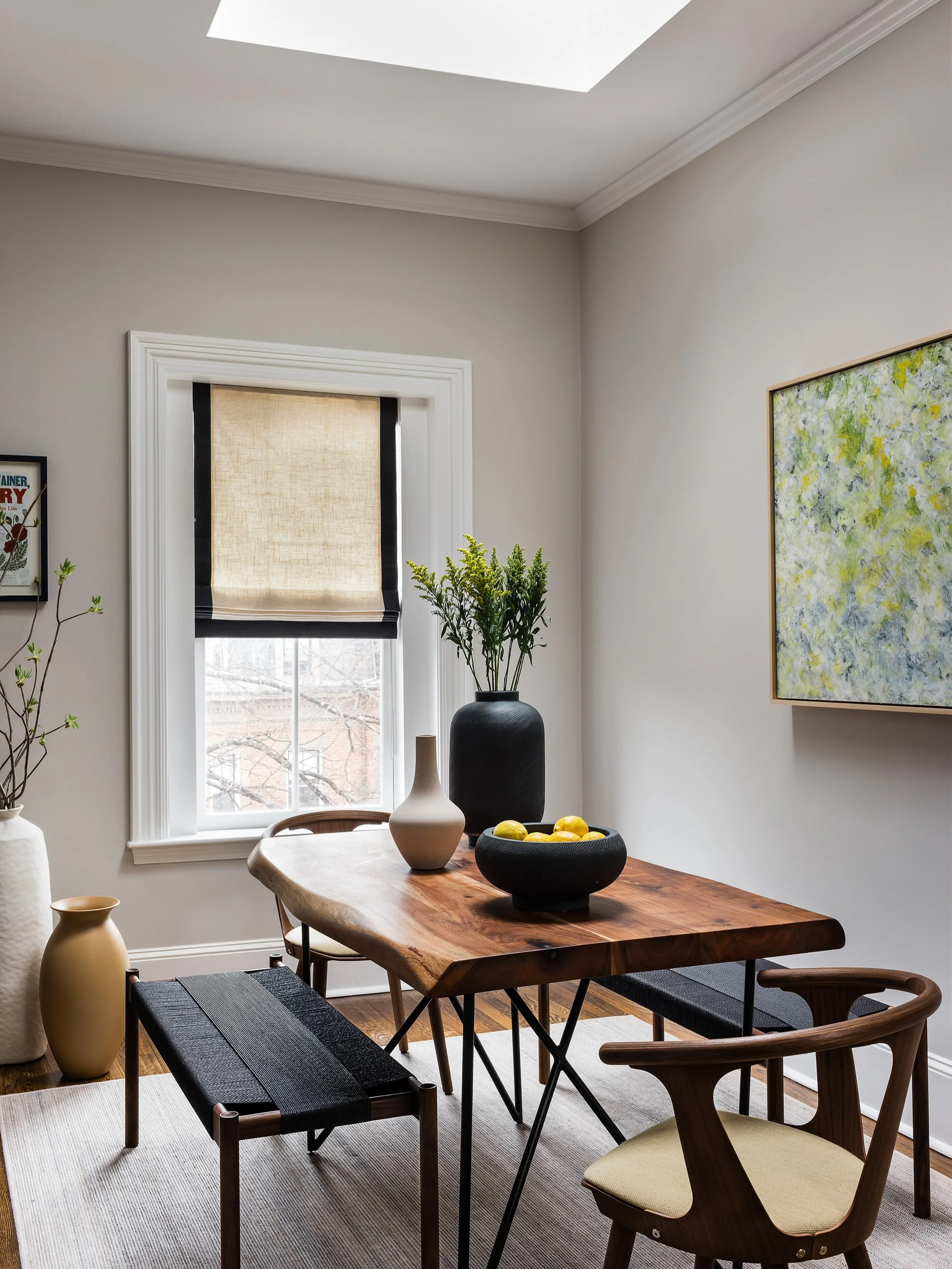 There&rsquo;s a certain kind of morning this room was built for. Gentle light from a skylight, a table with some age and character to it, an inviting bench instead of anything precious. This South End dining space is proof that slow mornings deserve 