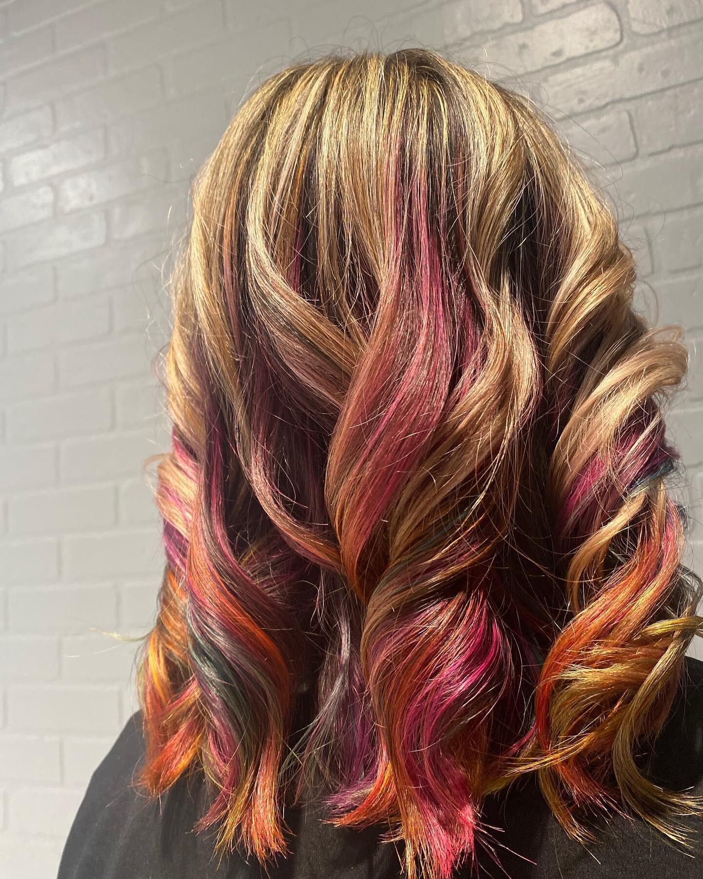 @hairbymikaylas when your associate is ready for a pop of color do it before they change their mind! Mikayla wanted to make her underneath hair colorful. She still wanted to keep her hair light on top. In love with the results💕@wemakeitvivid @pulpri