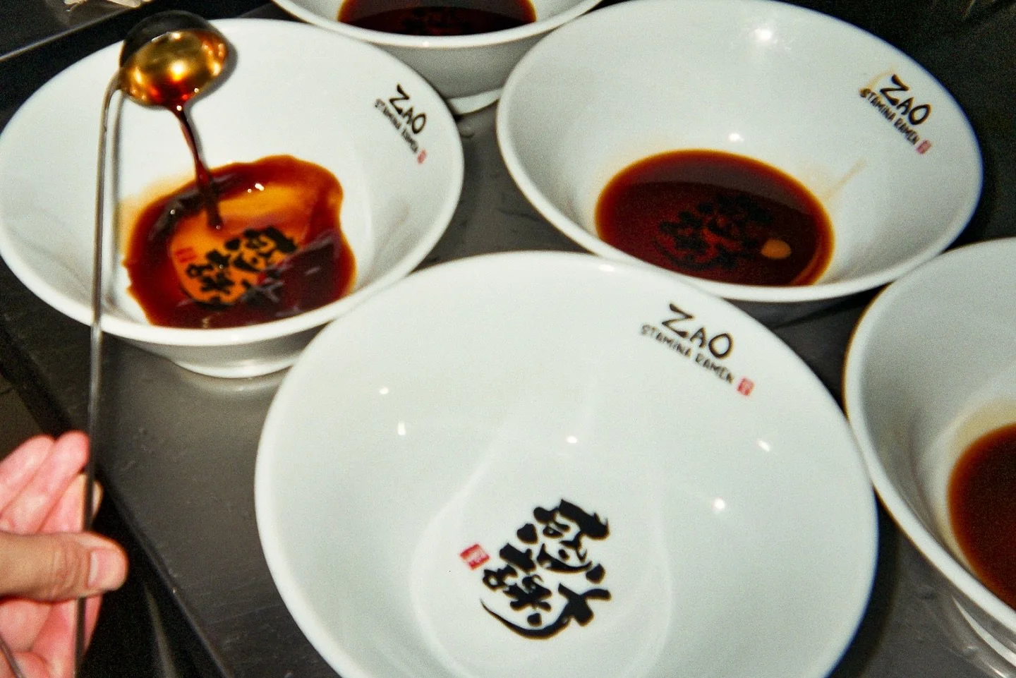 At the bottom of our ramen bowls, you’ll find the word ‘感謝 Gratitude’ written by @shiiiii_222 .
It appears only when you finish the noodles and savor the last drop of soup—a quiet message from us to you.
It carries our gratitu