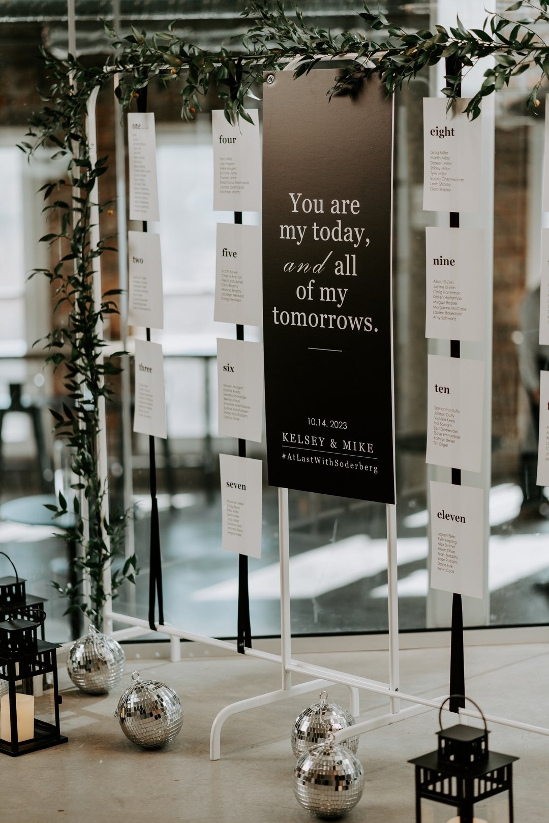 This seating chart was such a vibe! We love seeing the different personal touches each couple brings to their special day. We love the mix of black, white, and feathered greenery mixed with the concrete and the sparkle. Kelsey (the bride) had every d
