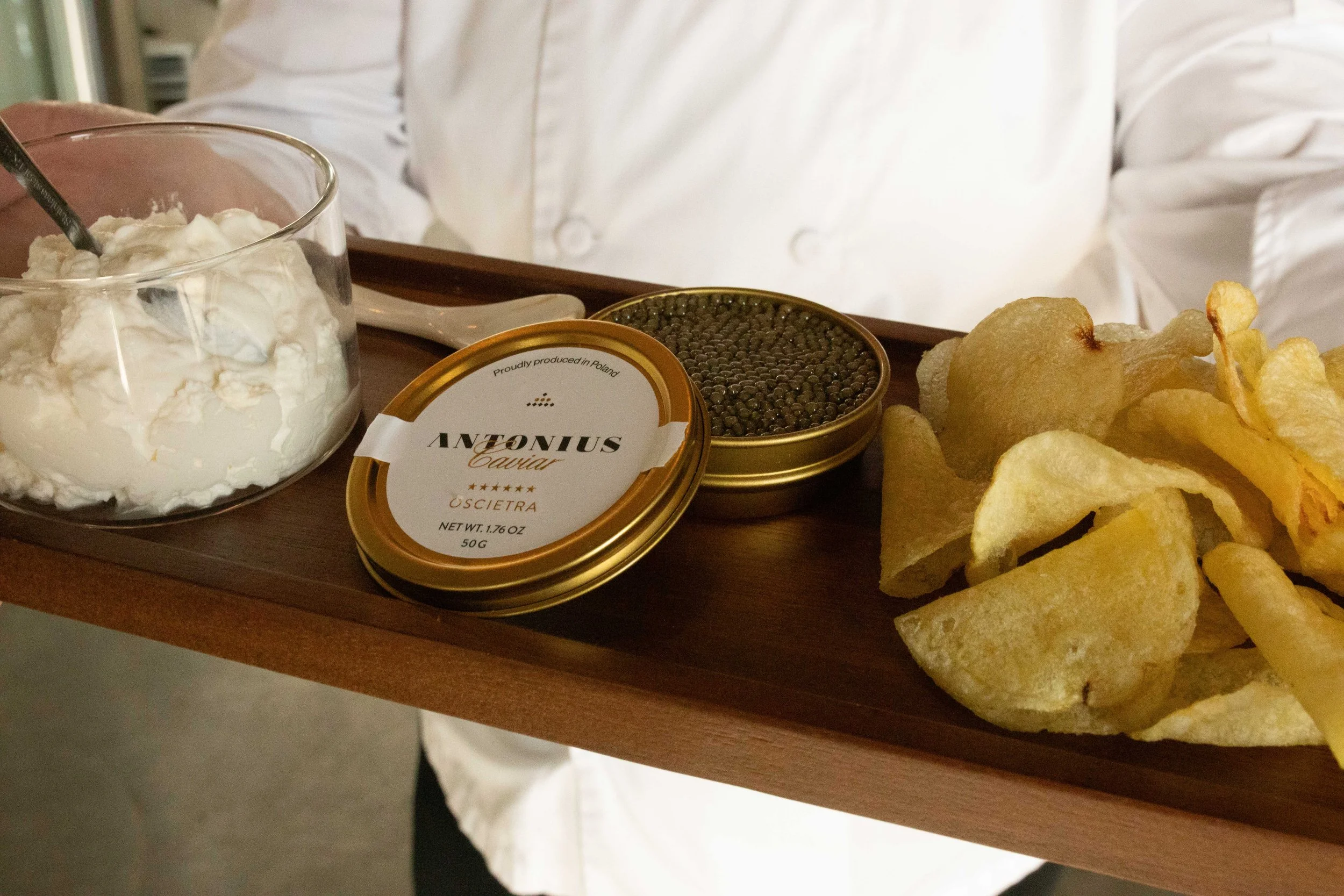 Sturgeon Caviar, crème fraîche and kettle cooked potato chips
