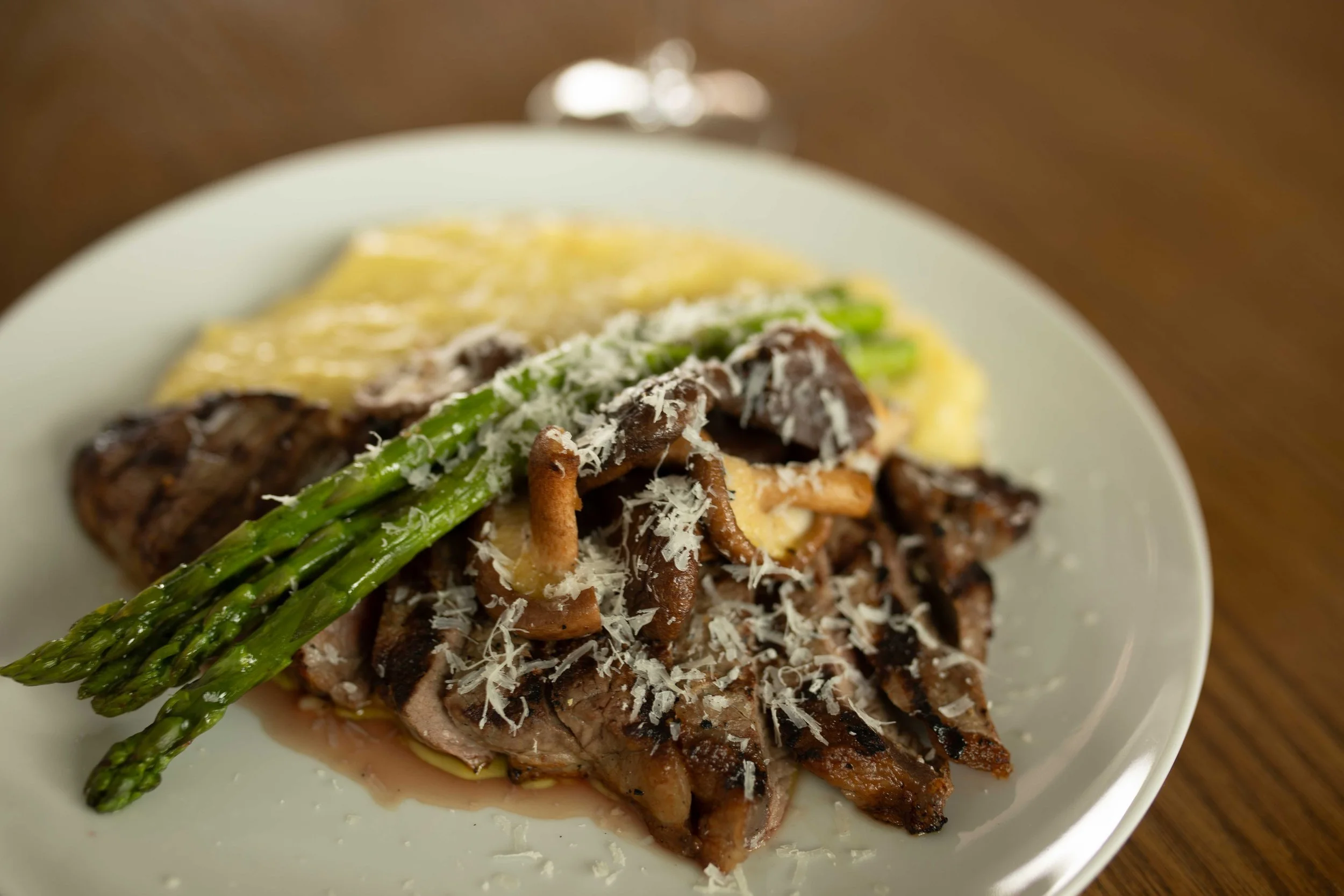 Grilled beef tenderloin with asparagus and truffle mashed potatoes and grilled mushrooms
