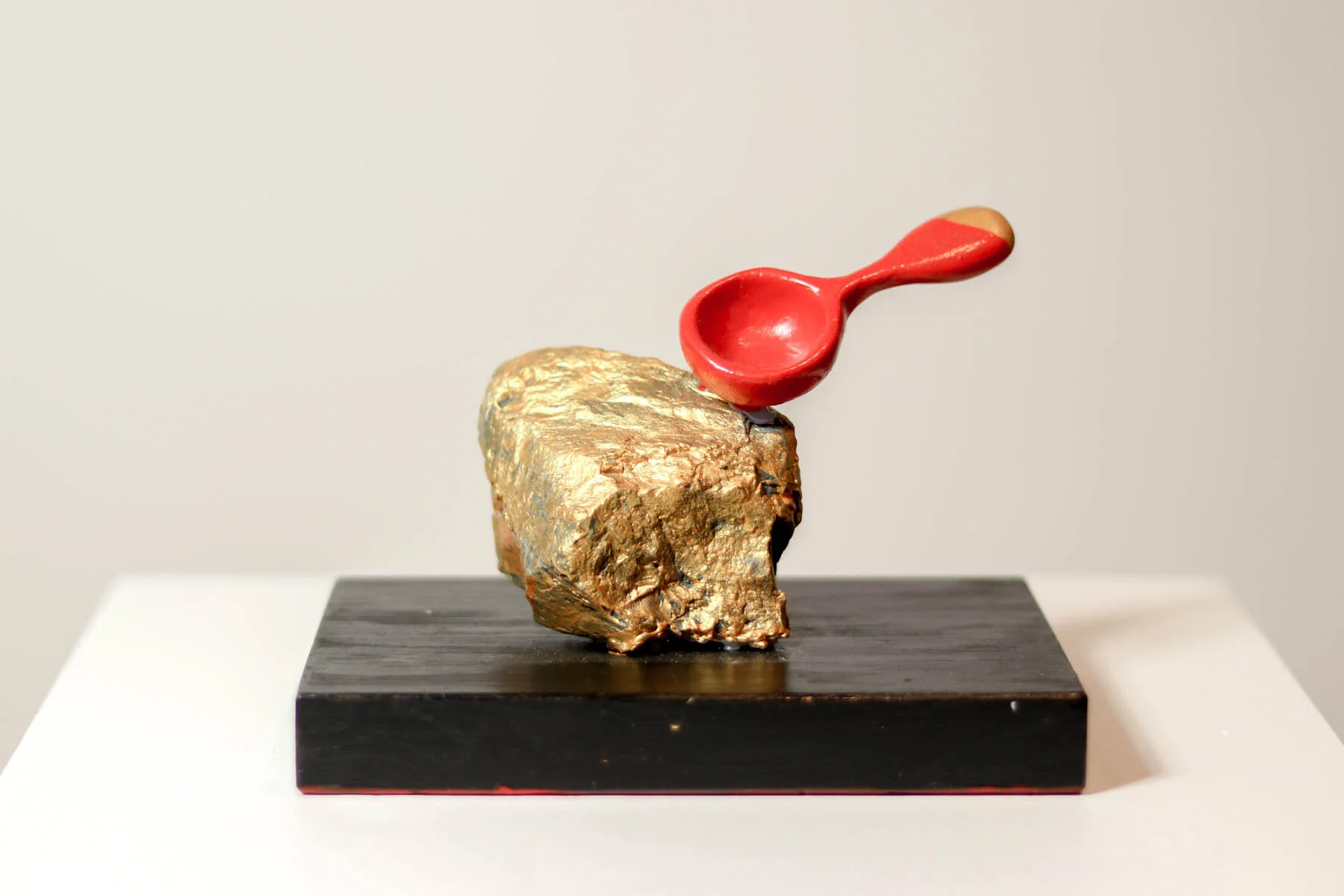 Bloody spoon on rock : about politics