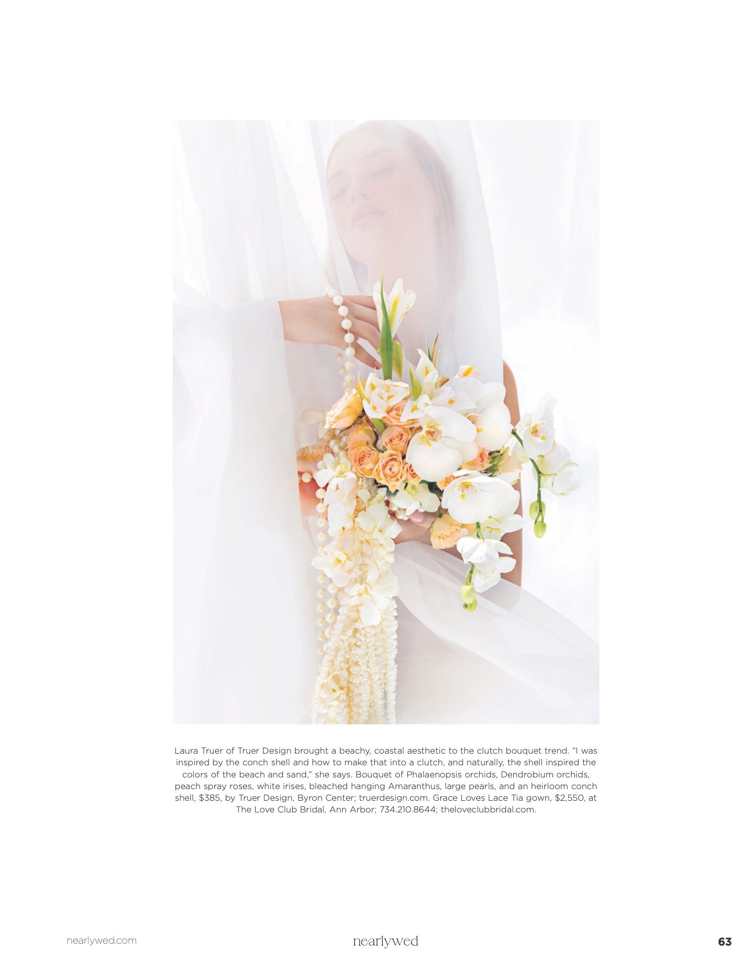 A bride wearing a wedding dress and veil holding a large bouquet of white orchids, peach roses, and other flowers, with a soft, ethereal lighting effect. hairstylist-metro-detroit-bridal-hair-updo-effortless-engaged