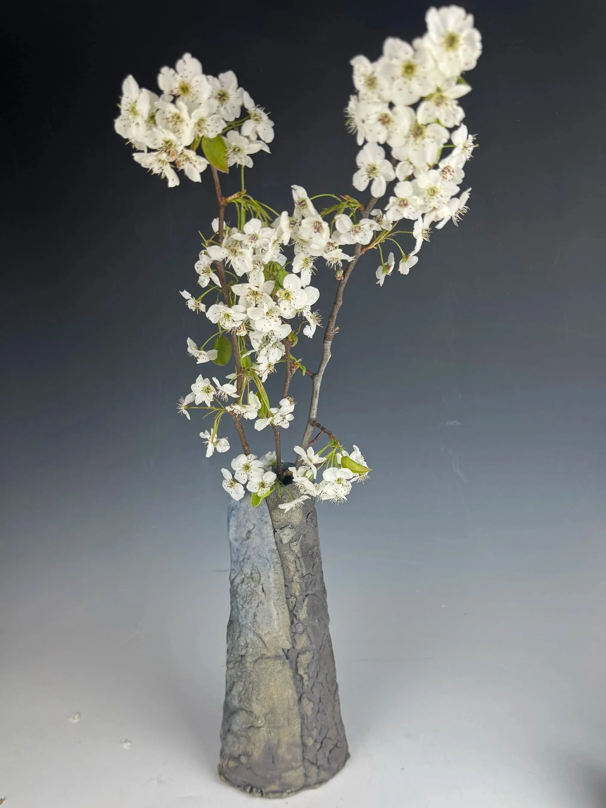Woodfired Vase with flowers 