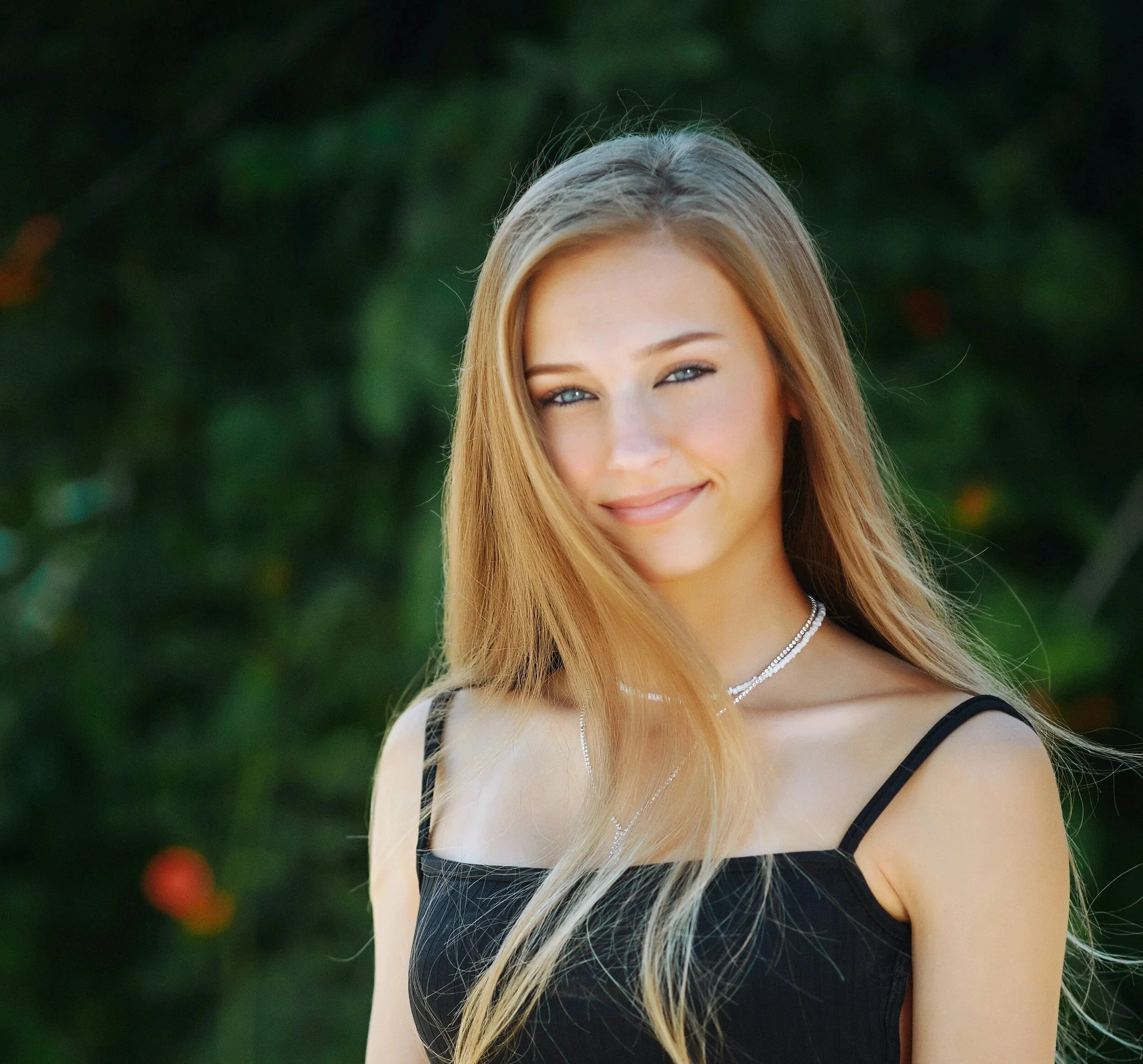 Phoenix senior picture locations, girl with long blonde hair in a black spaghetti-strap top