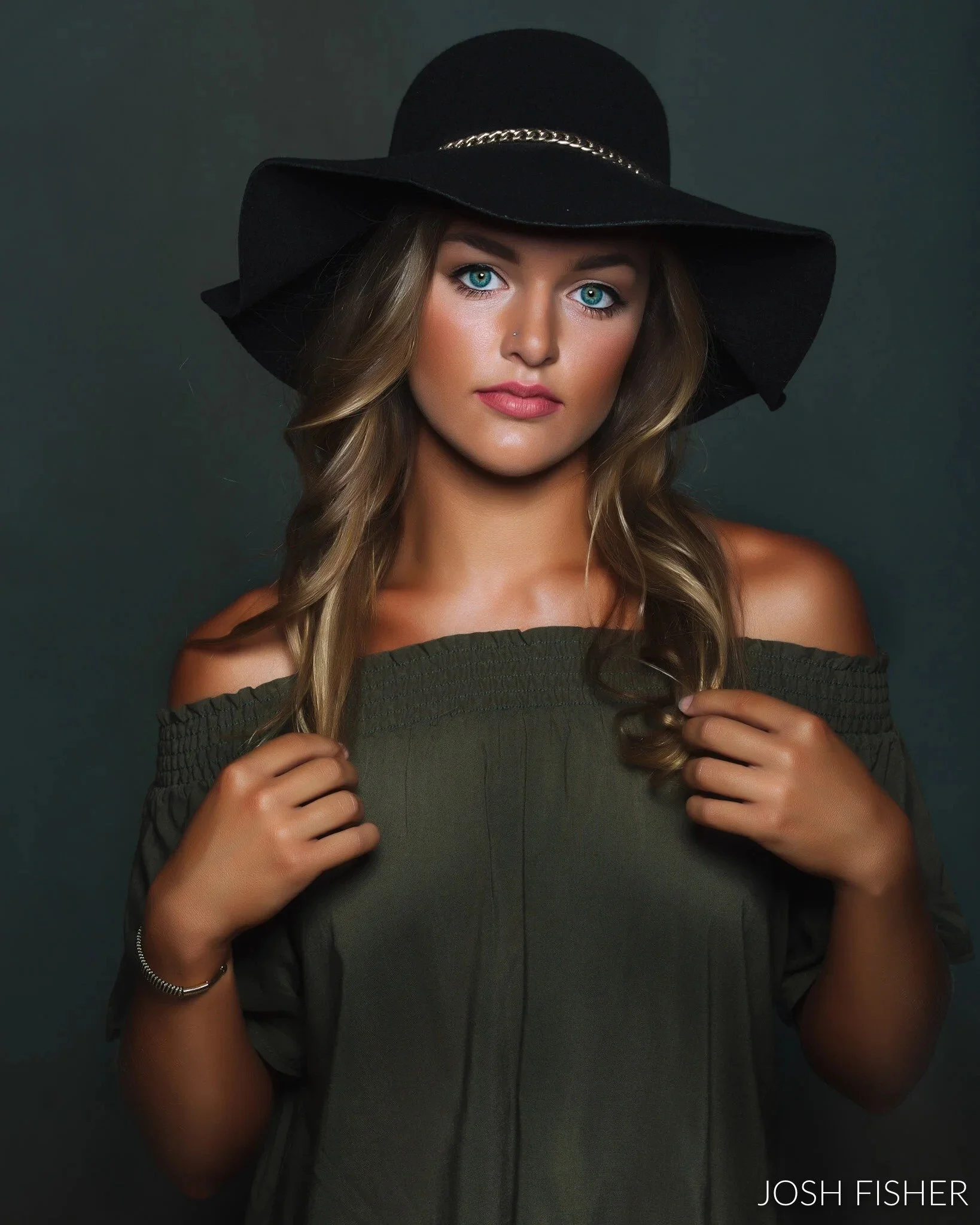 Phoenix senior picture locations, girl in a black wide-brimmed hat and off-the-shoulder top