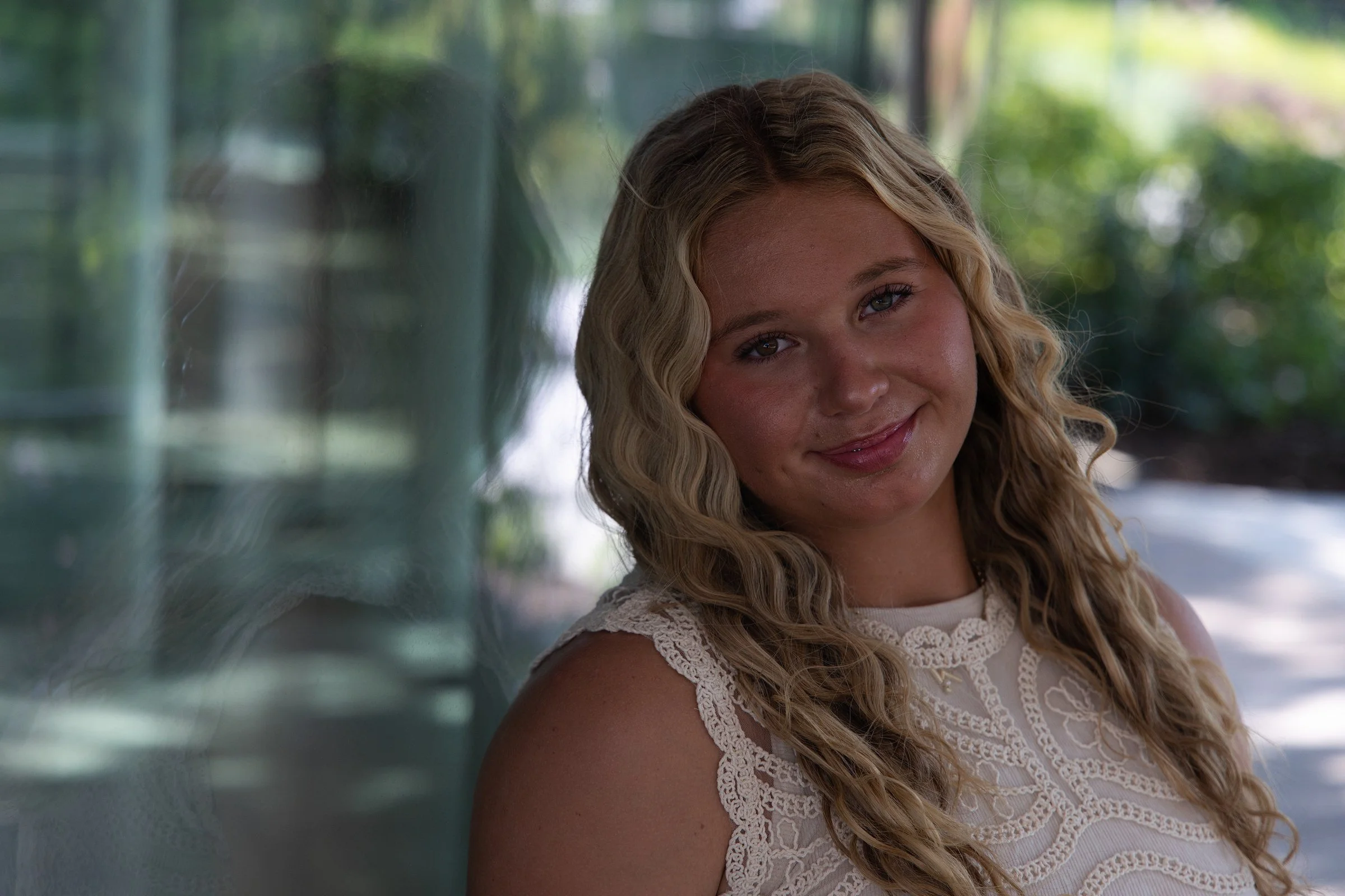 Oklahoma City senior pictures - Kinsey lace top by the glass wall