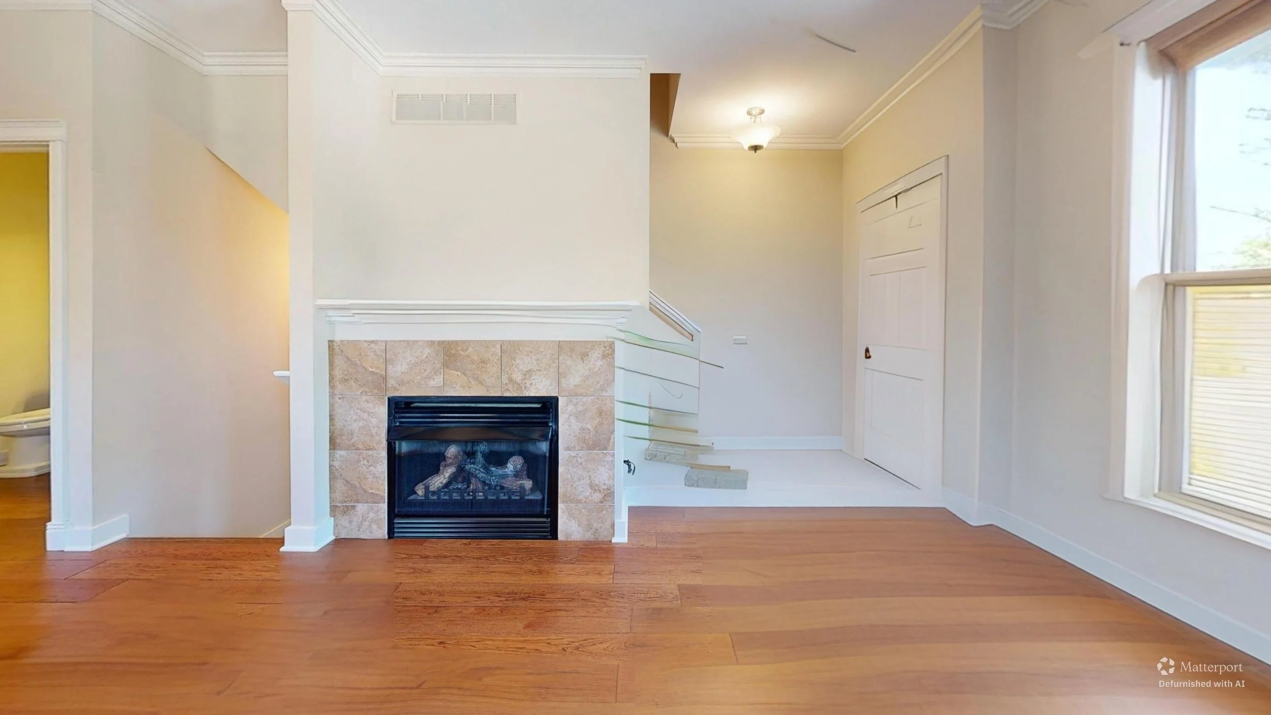 1005-Walker-Cir-Living-Room-Defurnished.jpg