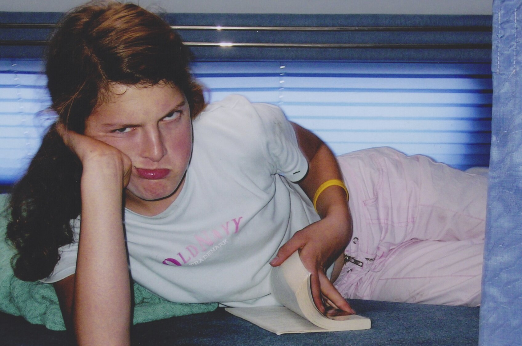  Me as an annoyed preteen. Someone had interrupted my reading, after all! 