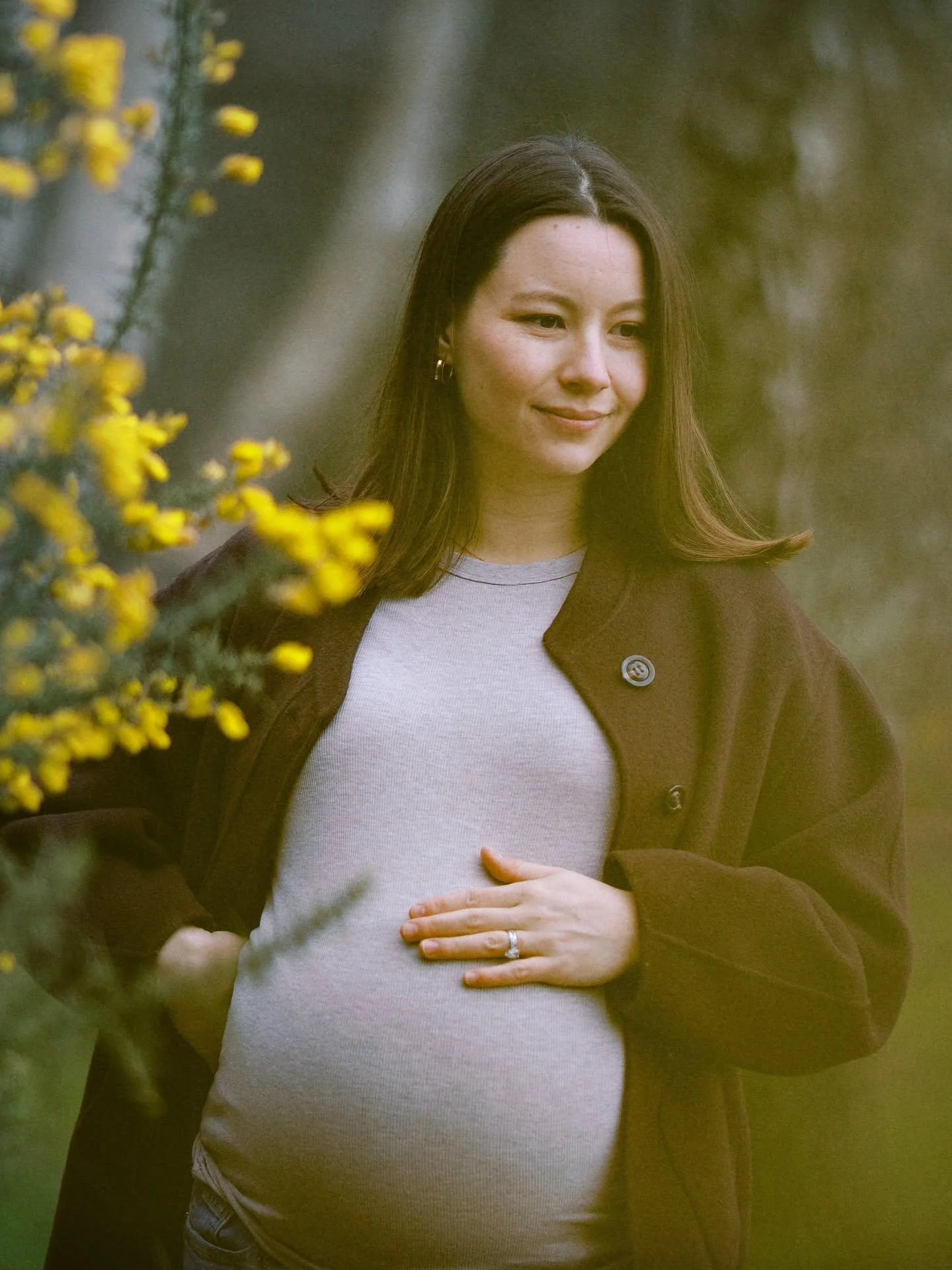 This body,
no longer a boundary&mdash;
just a place where life overlaps,
doubles,
insists.

A hand resting where movement answers back.

This is how I love maternity portraits:
true enough to remember
how it felt to carry two futures
at once.
.
.
.
.