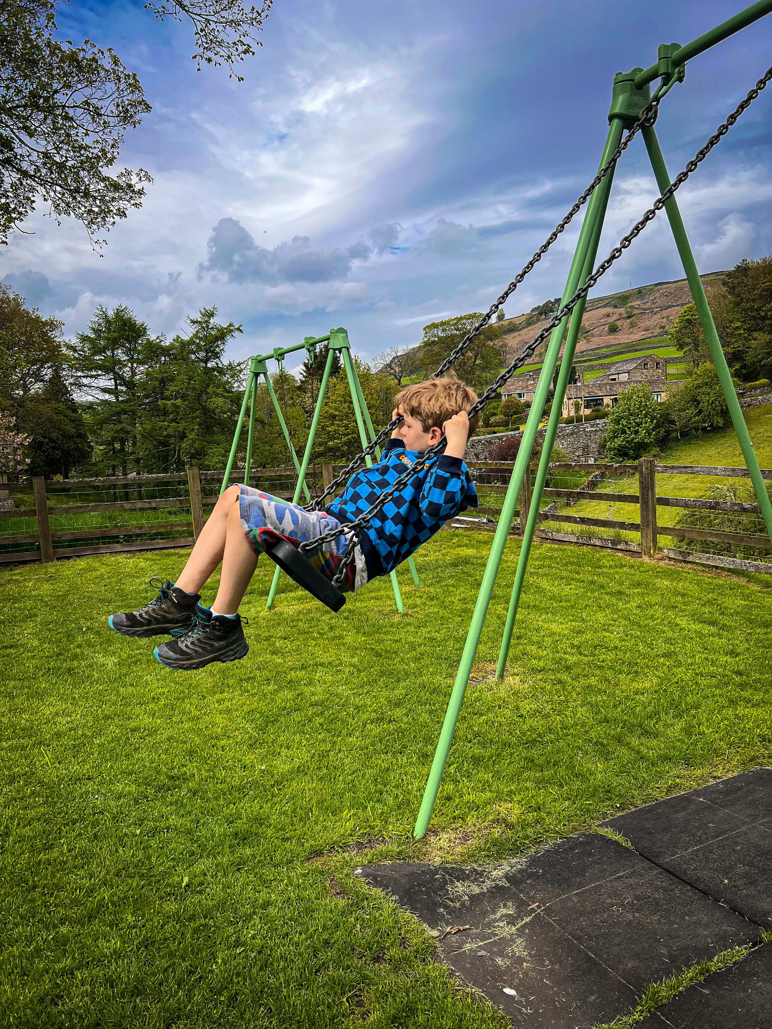 Swinging on the swing at Hebden play park
