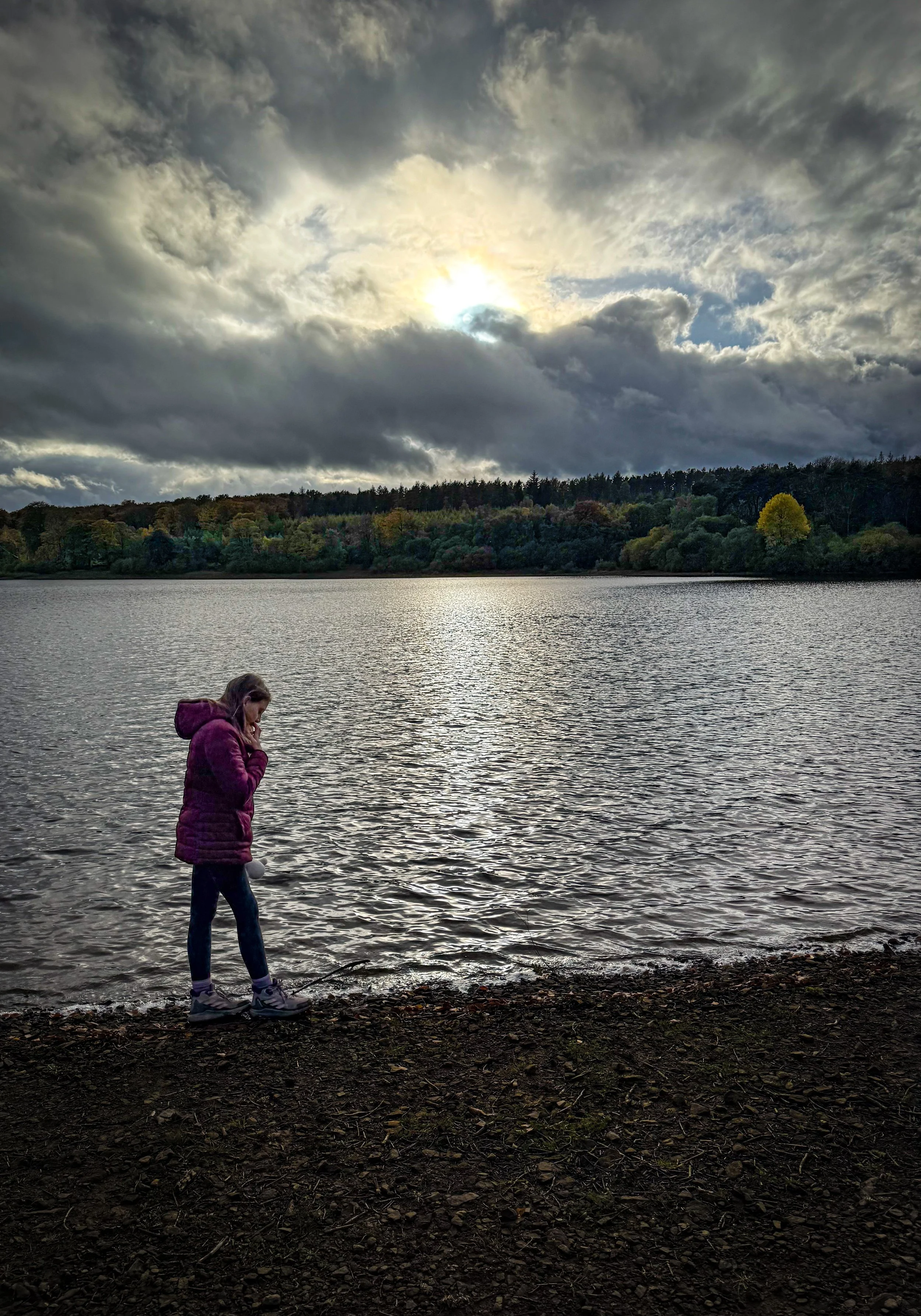 Child Walking along the edge of Swinsty reservoir