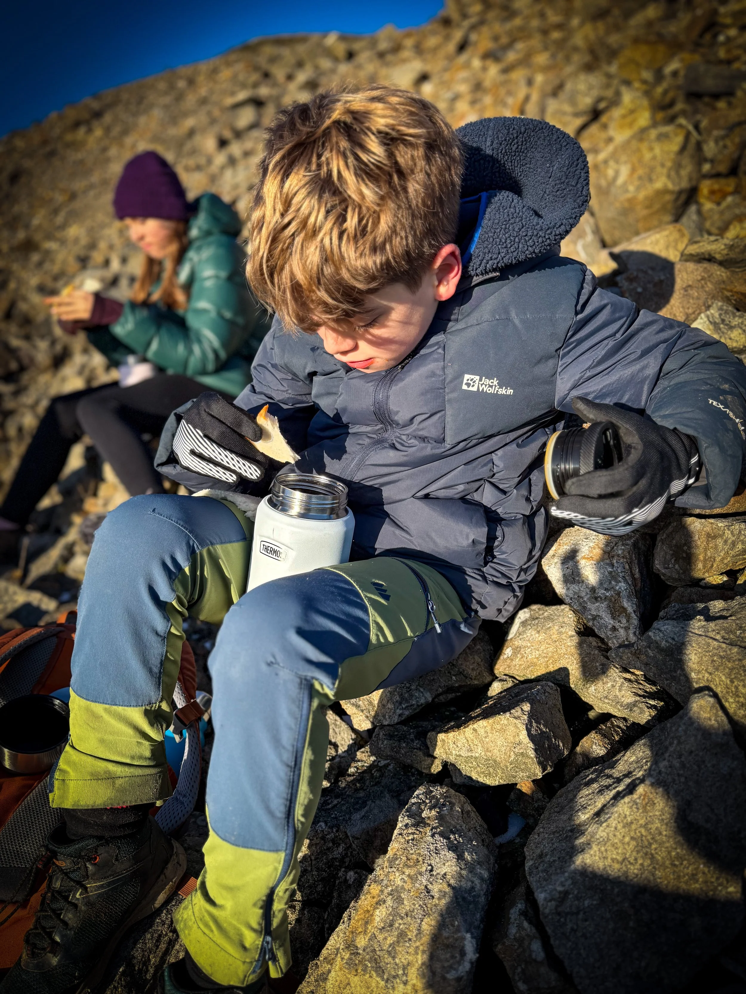 Child Eating from a hot picnic Thermos flask