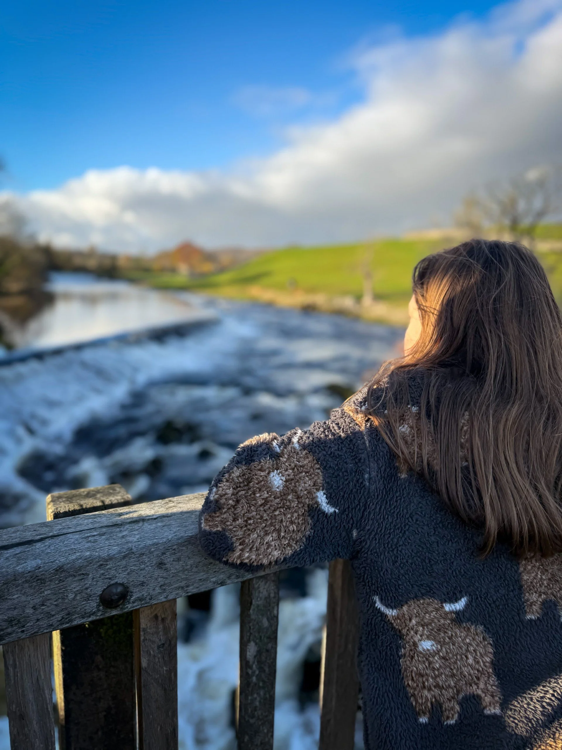 Child sitting at Linton Falls