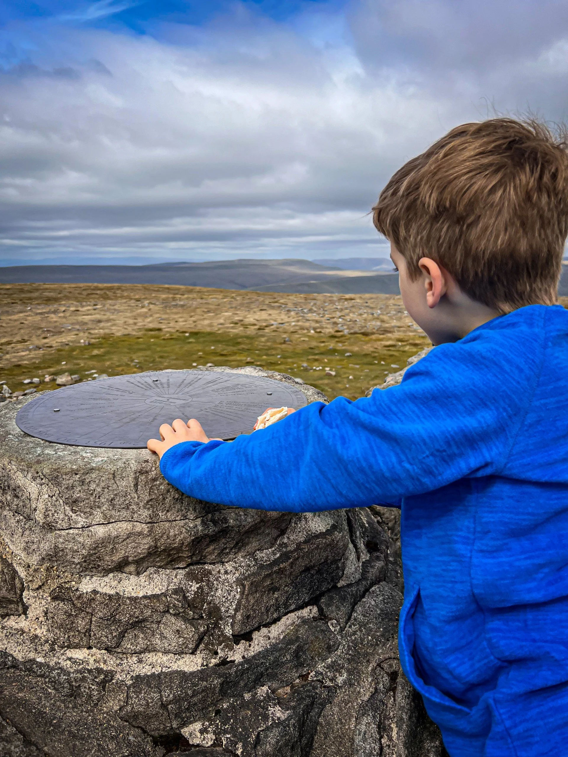 Child Standing with viewpoint and mountains