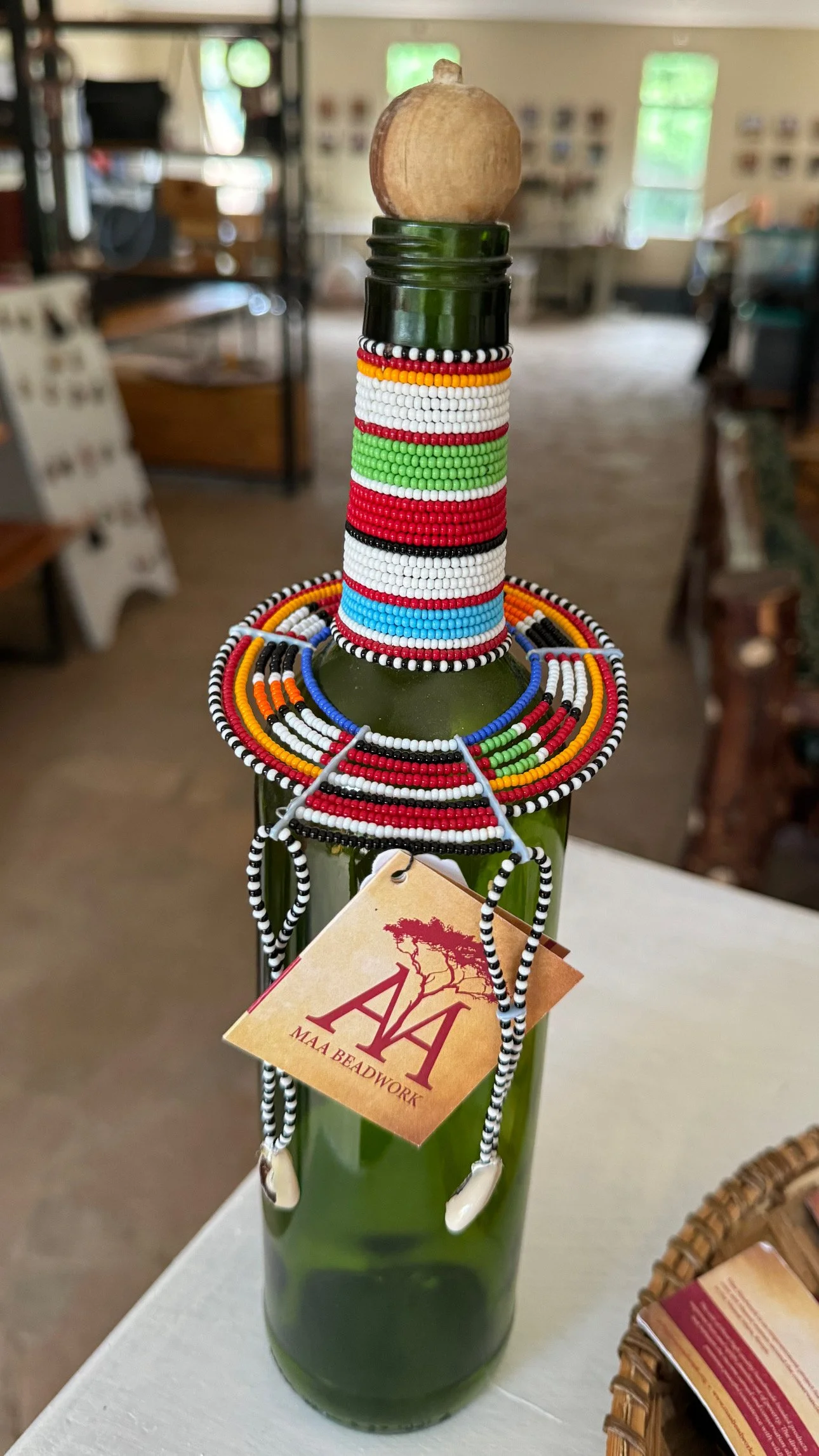 maasai_beading_maa_trust_initiative_woman_respect_consciousness_decorated_bottle_in_a_hotel_colourful_tanzania_maasai_kenia_africa.jpg
