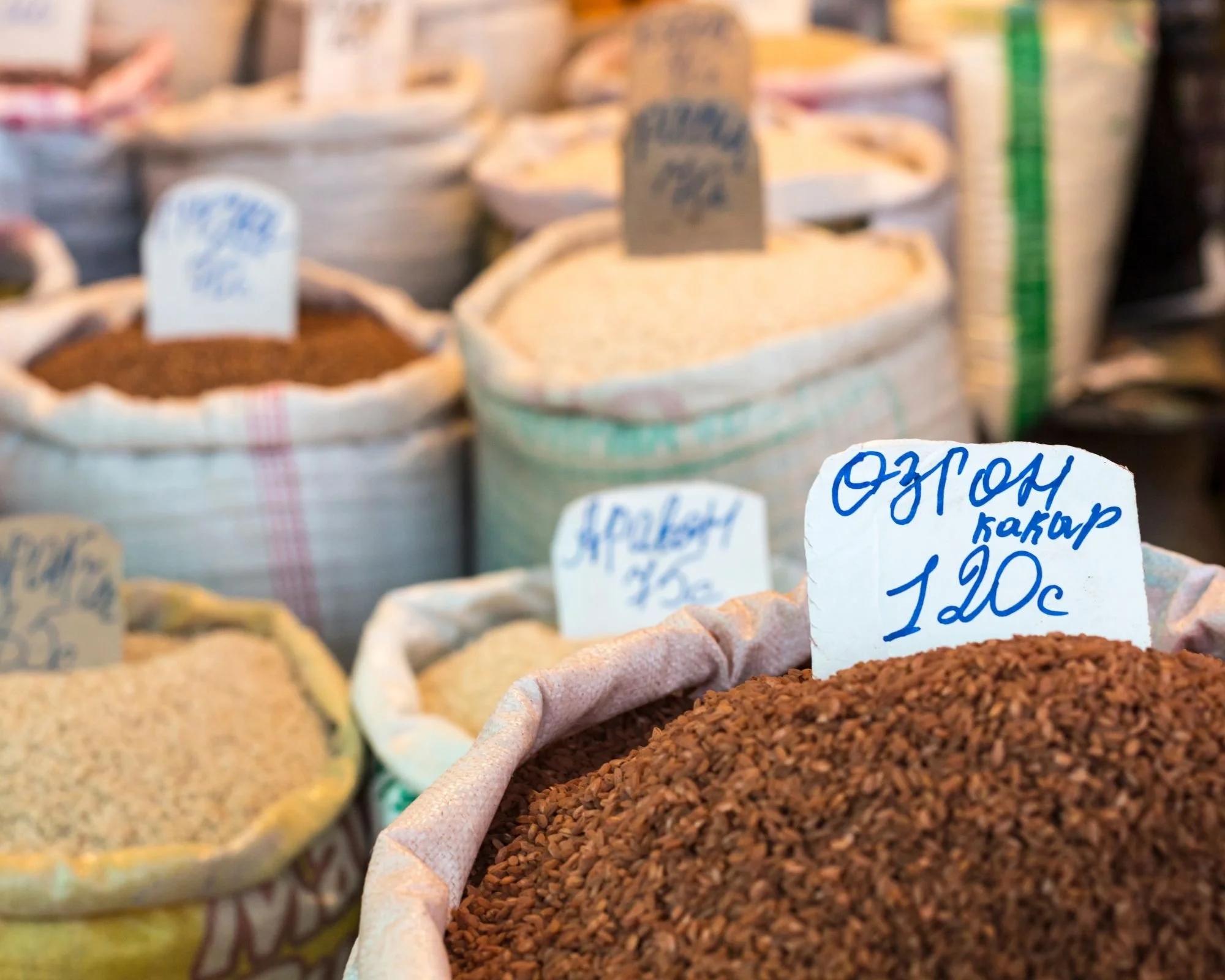 Spices and vegetables in bags at local bazaar in Osh..jpg