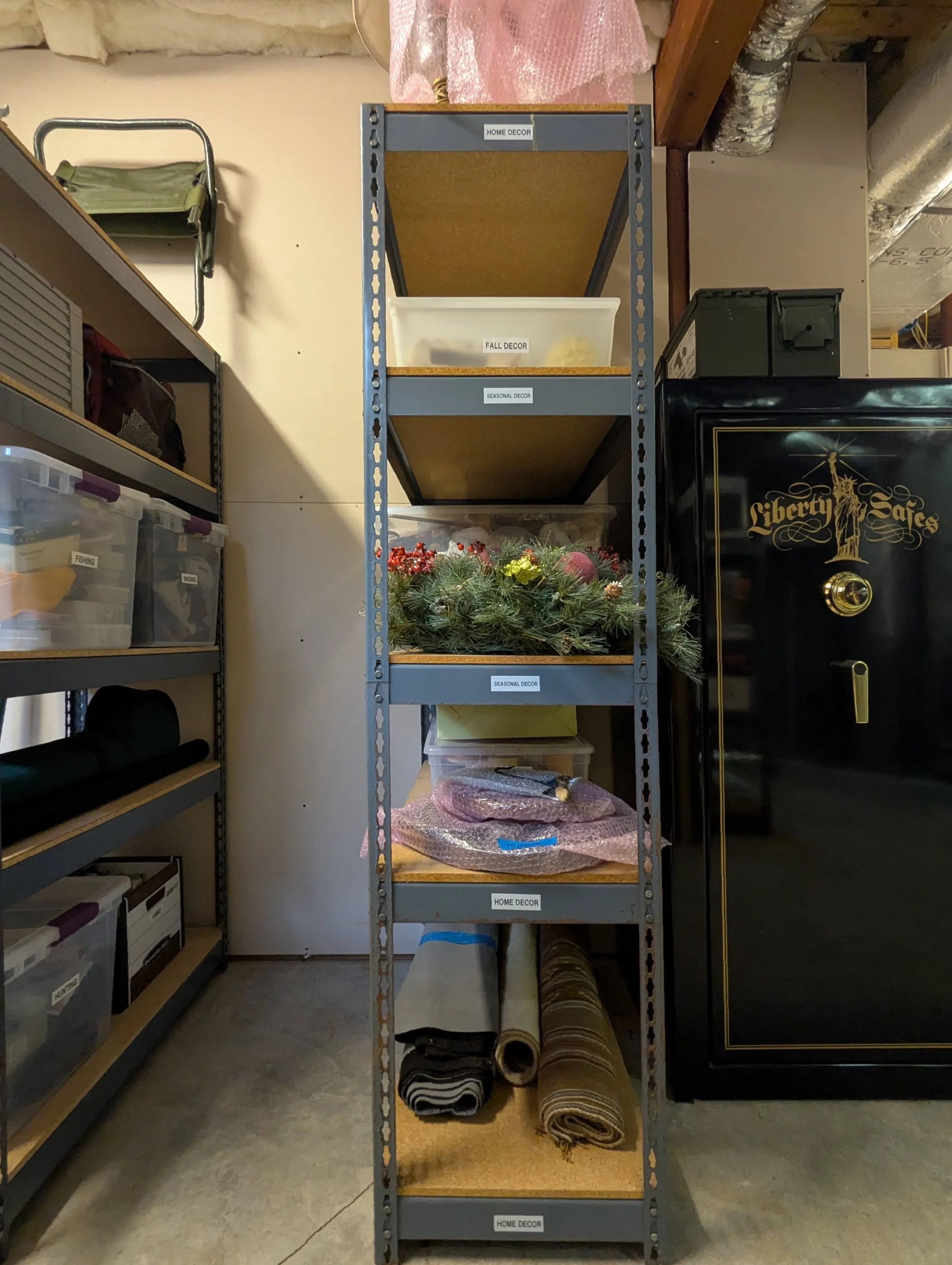 Seasonal holiday decorations neatly stored in labeled containers by Green Mountain Space North Carolina