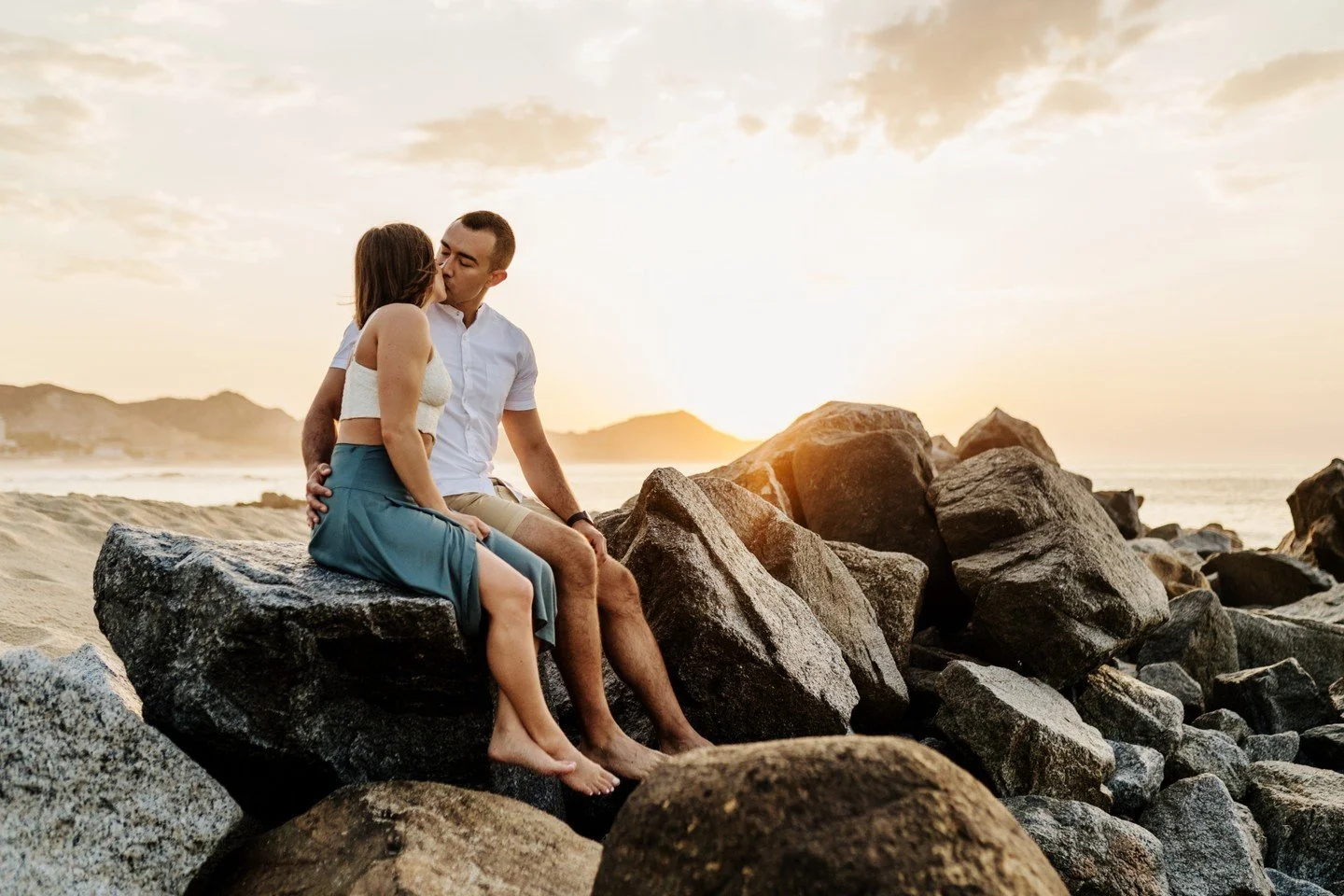 This couple was absolutely amazing! I was blown away by how deeply they connected with each other and how adventurous they were. I asked if they were up for getting a little wet, and this is what happened: Would you dare to dive into the ocean fully 