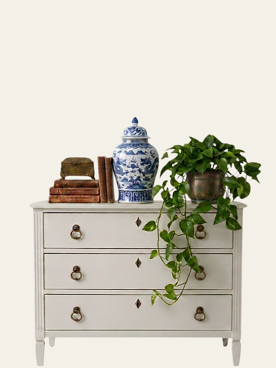 Furniture painted in Bone by Mélange Paints, a warm alabaster white furniture paint.