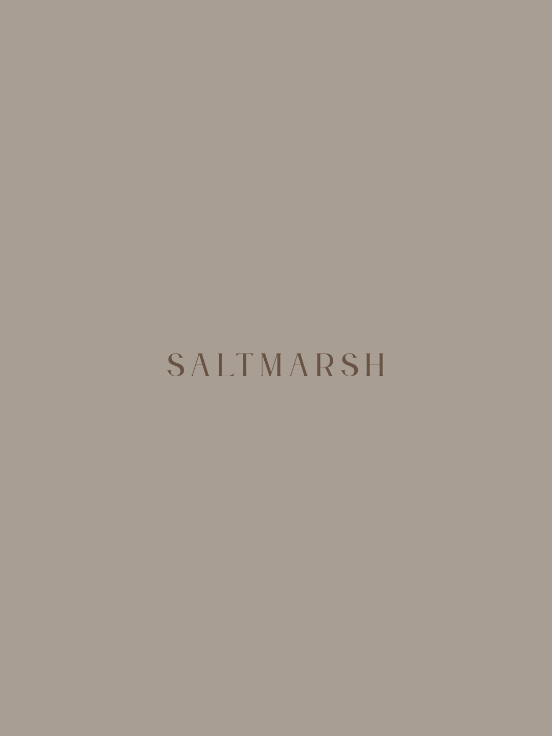 Saltmarsh is a a weathered taupe-gray inspired by driftwood and marshland. Ideal for dressers, built-ins, cabinetry by Melange Paints.