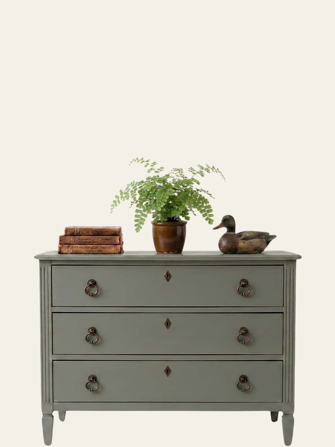Furniture painted in Limberlost by Mélange Paints, a gray olive green furniture paint.