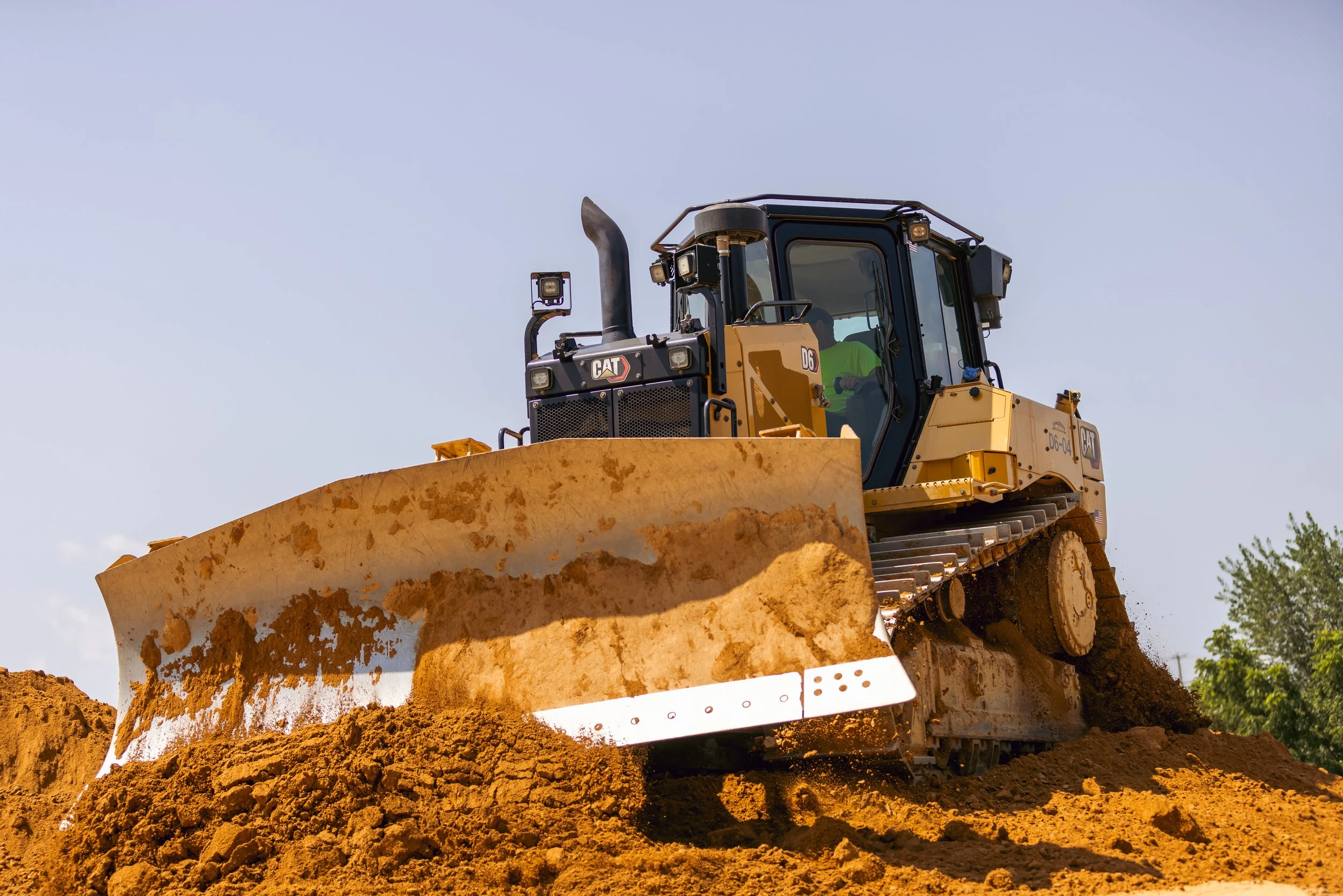 CAT D6 pushing off a load of dirt at the Brandywine Farms project