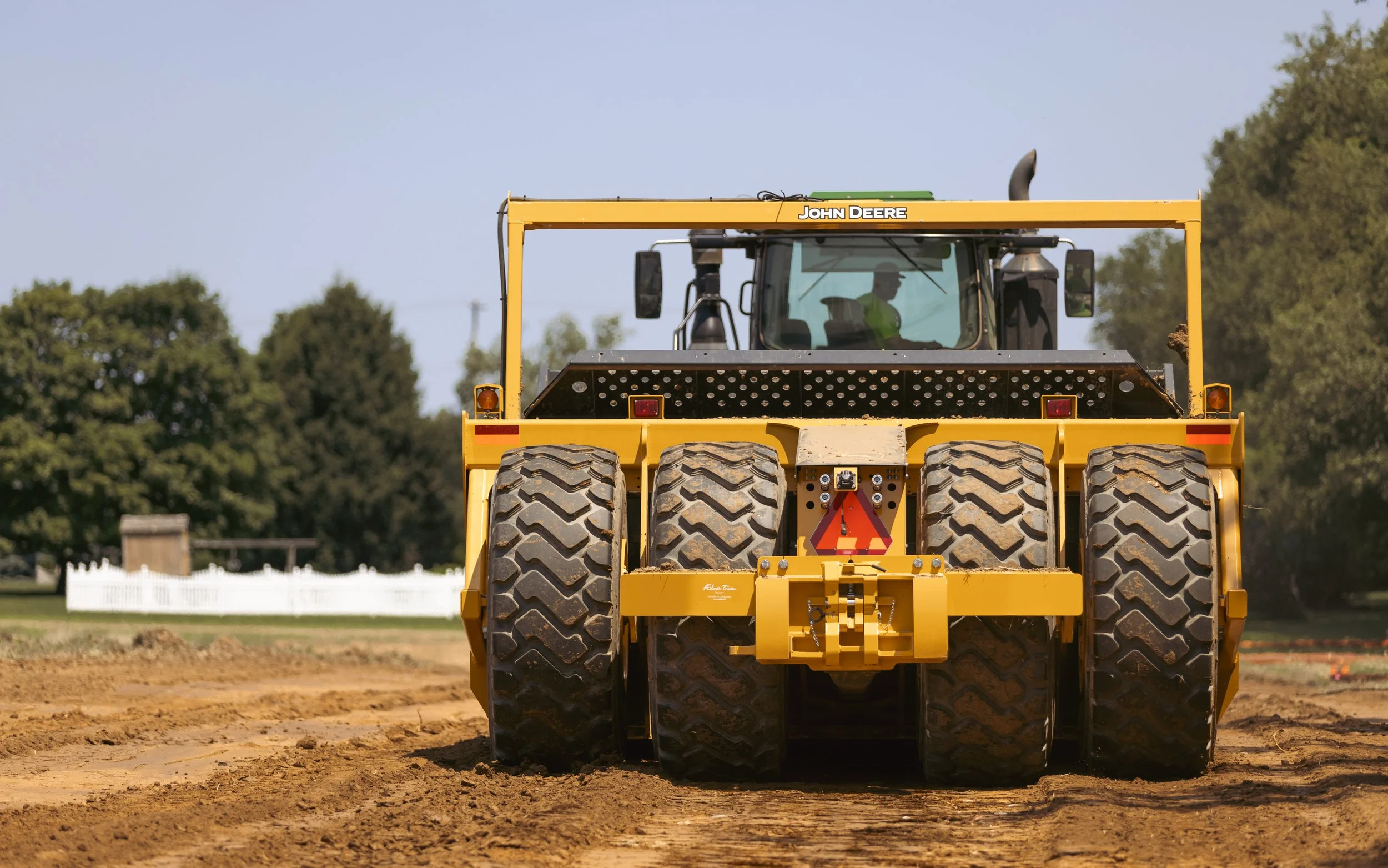 Excavation Process at Harvest Run Project - John Deere Tractor Stripping Topsoil to Lay the Foundation for a Premier 55+ Community by Lyons & Hohl and Traditions of America