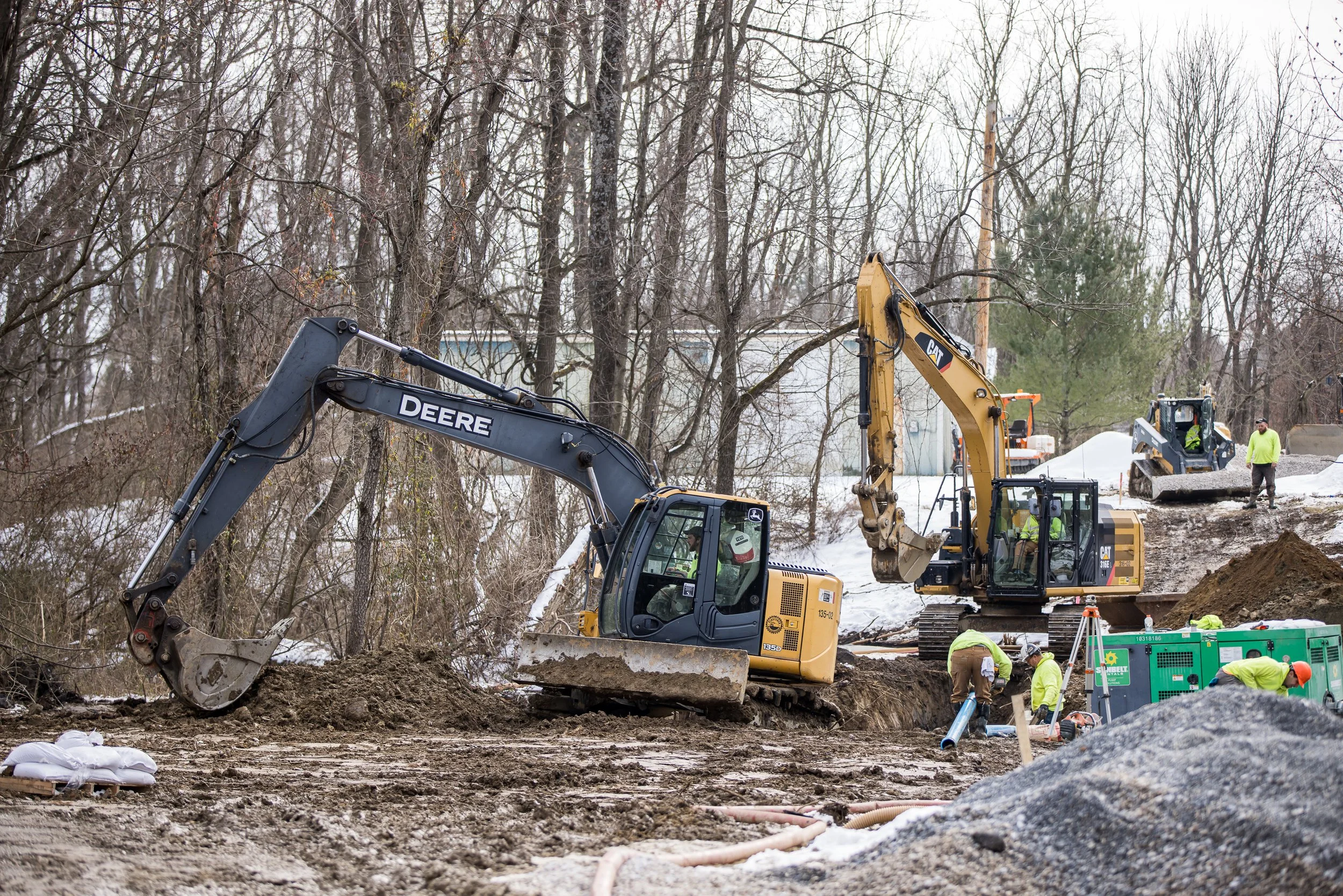 Pipe crew installin off-site force main sanitary sewer.