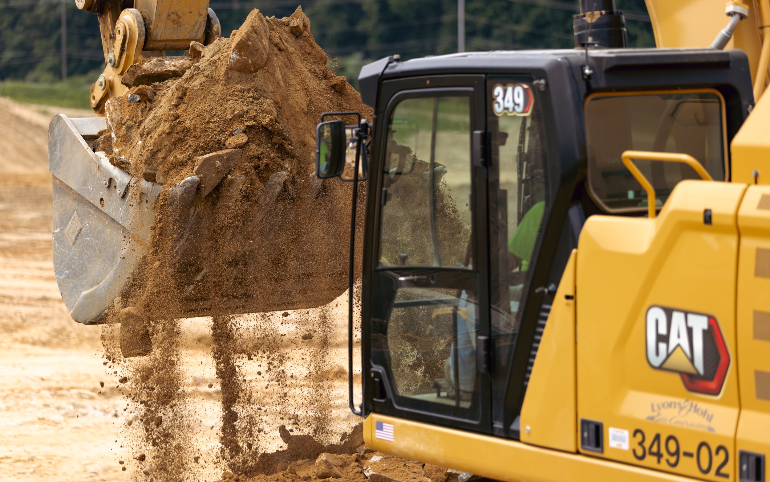 CAT 349 digging dirt at the Brandywine Farms project
