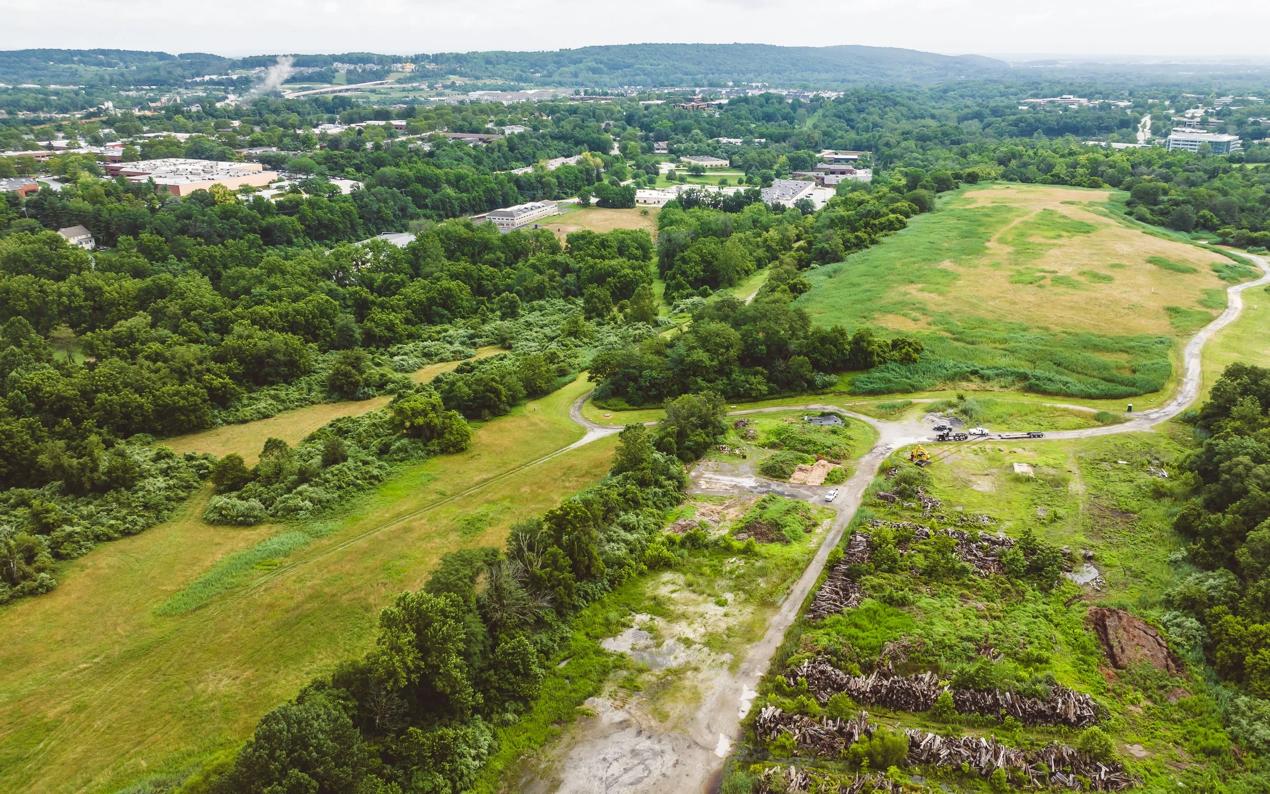 Aerial view of Anfield @ Malvern, a premier development in Chester County, showcasing the progress of the construction site near Route 29 and Route 202.