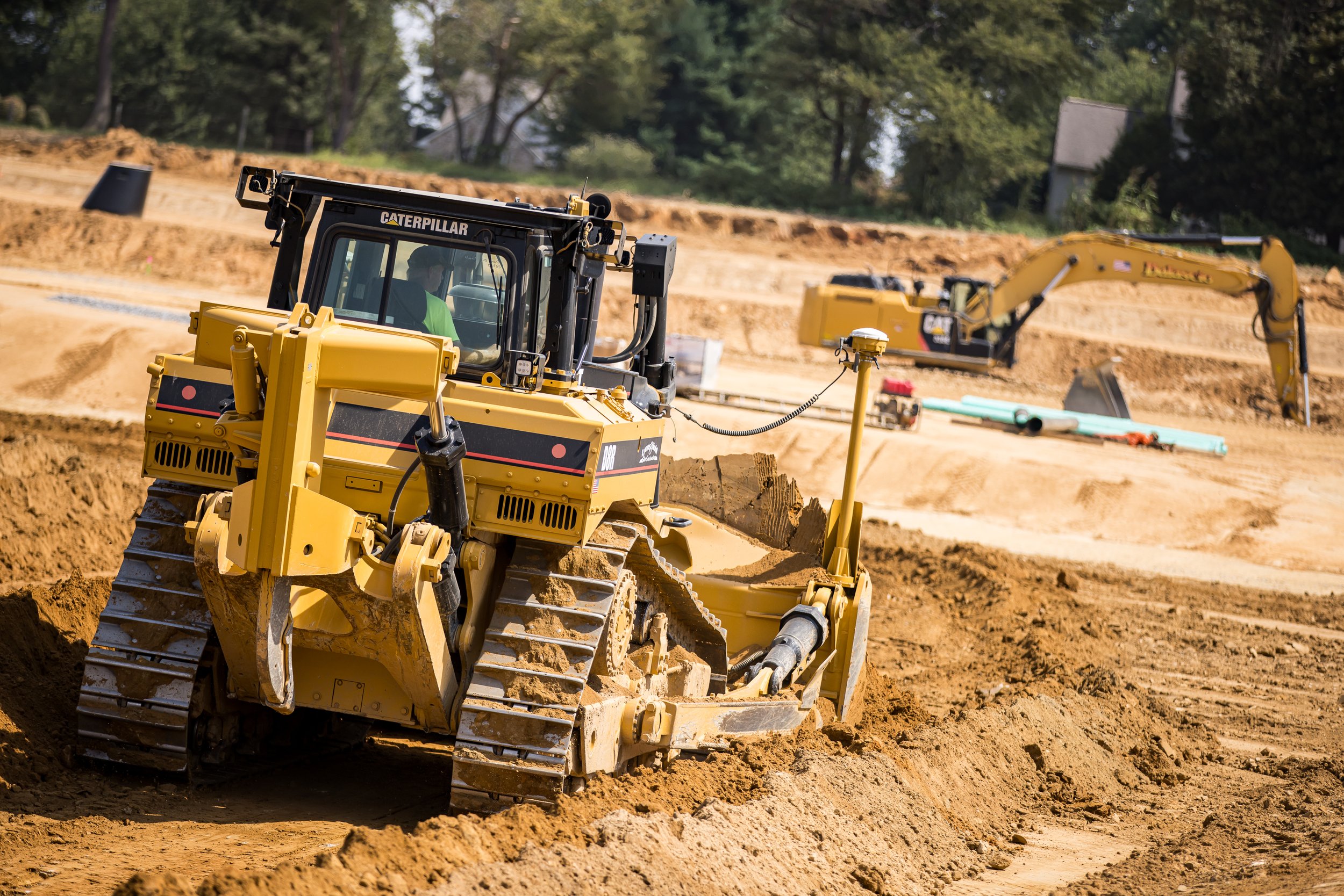 CAT D8R Dozer pushing fill at the Brandywine Farms project for Traditions of America
