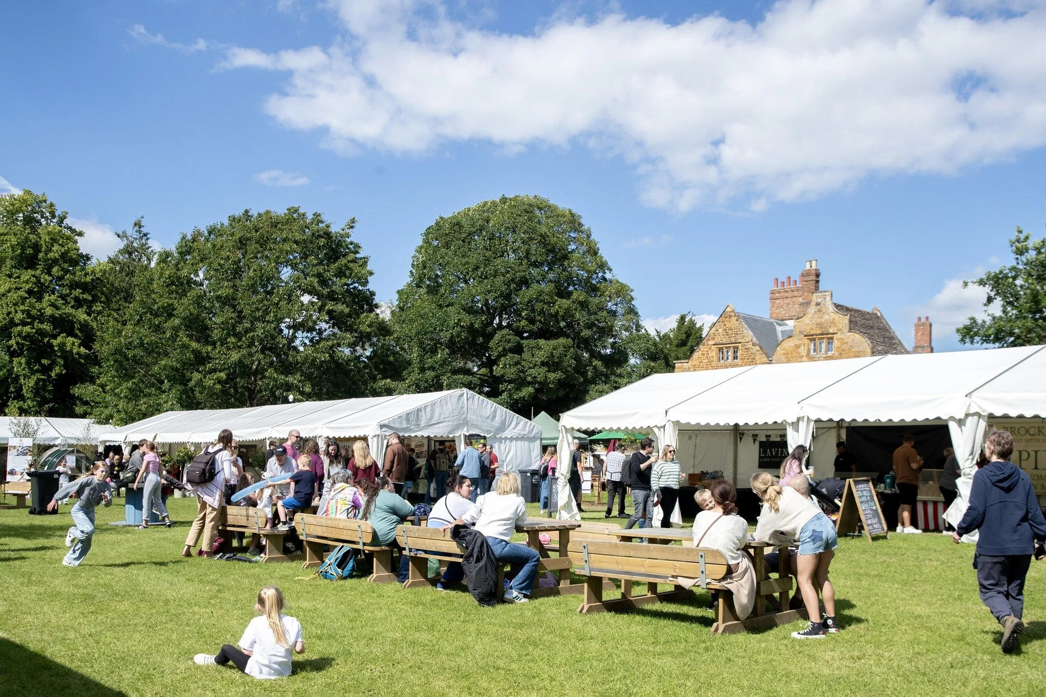 Visitors at a previous food festival at the venue enjoying the grounds and food