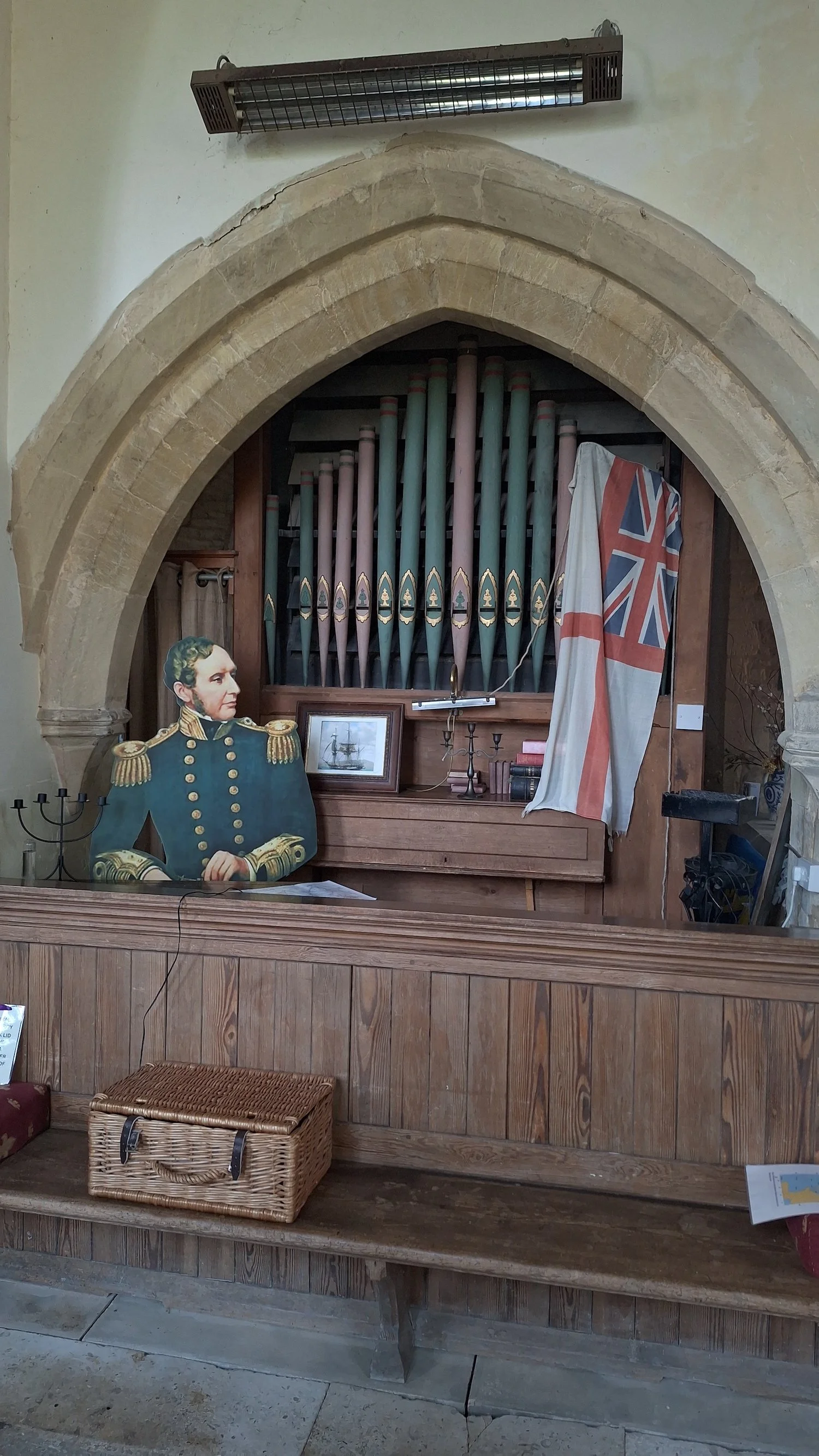 Historical figure near the organ